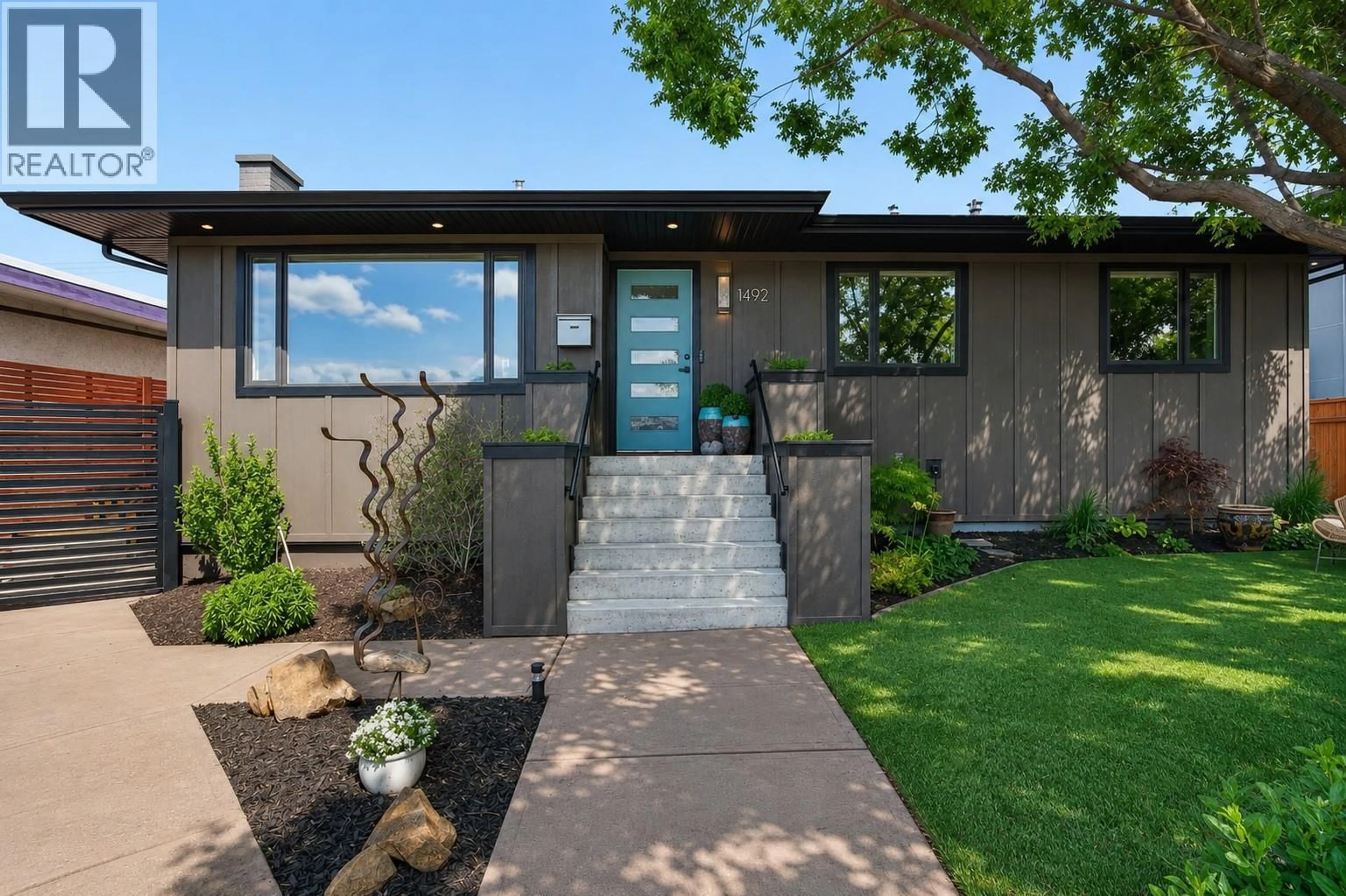 Home with vinyl exterior material, street for 1492 LEIR STREET, Penticton British Columbia V2A4Z5