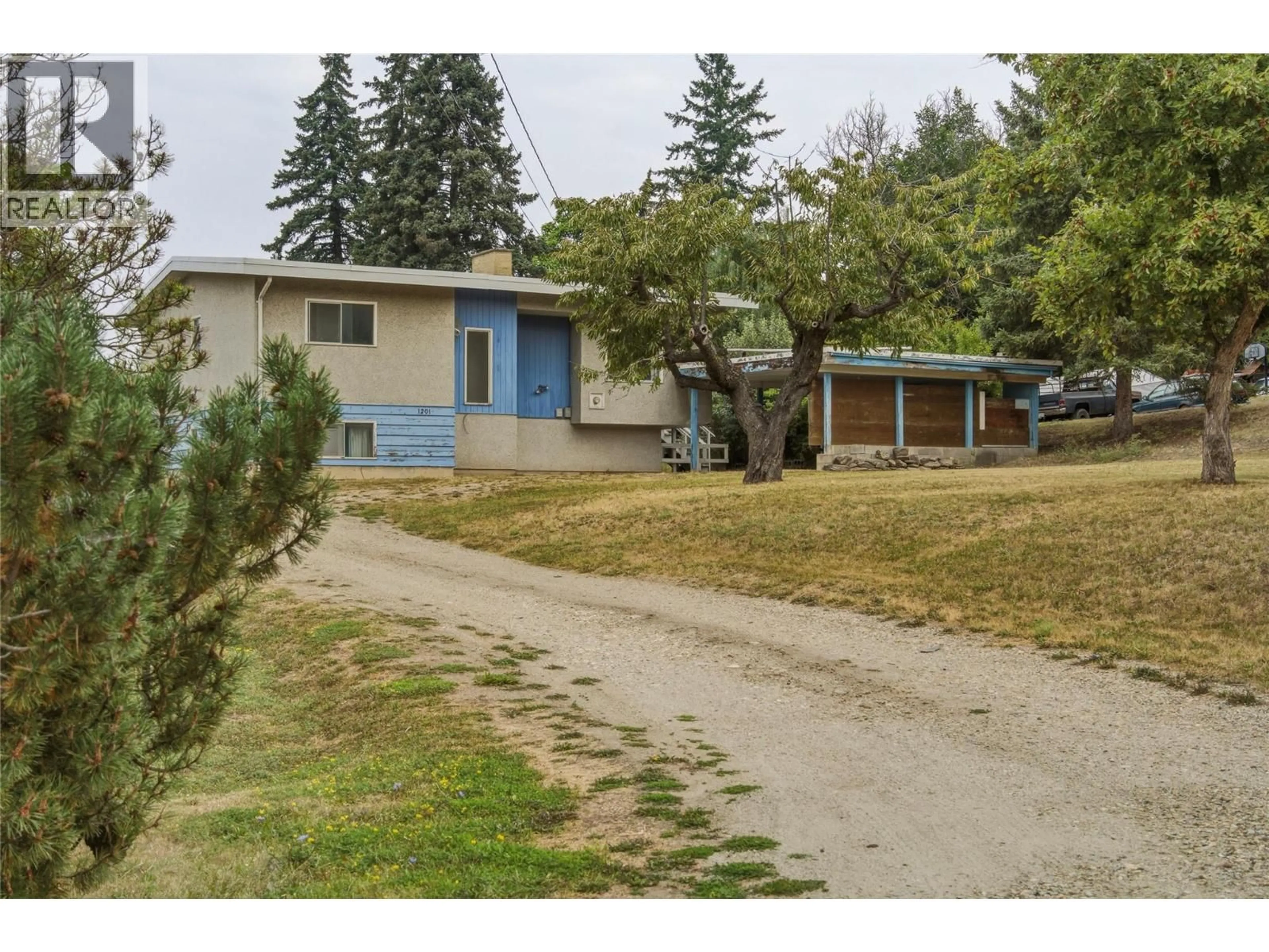 A pic from outside/outdoor area/front of a property/back of a property/a pic from drone, street for 1201 8 AVENUE NORTHEAST, Salmon Arm British Columbia V1E4A5