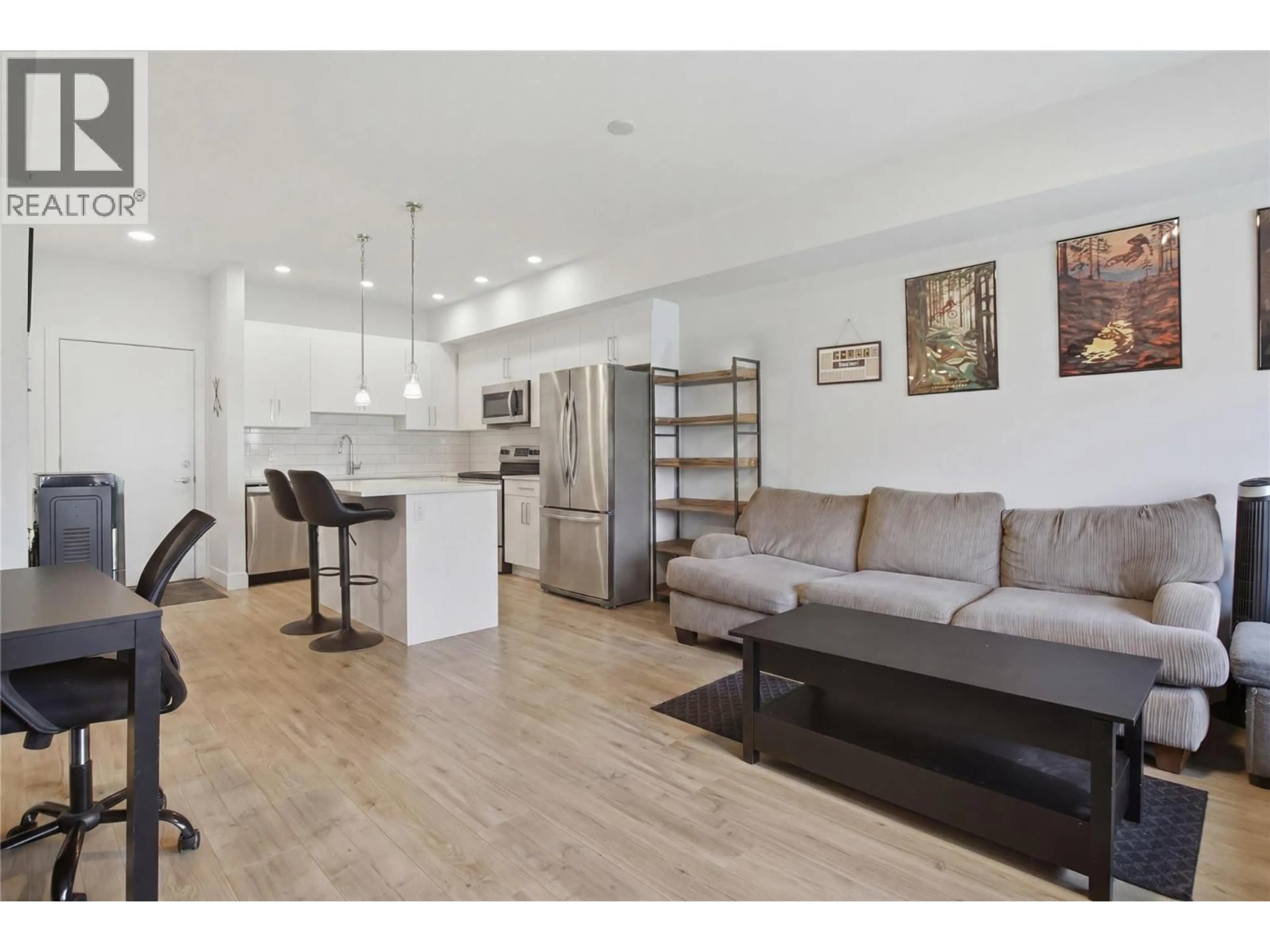 Open concept kitchen, wood/laminate floor for 316 - 2046 ROBSON PLACE, Kamloops British Columbia V2E0A5
