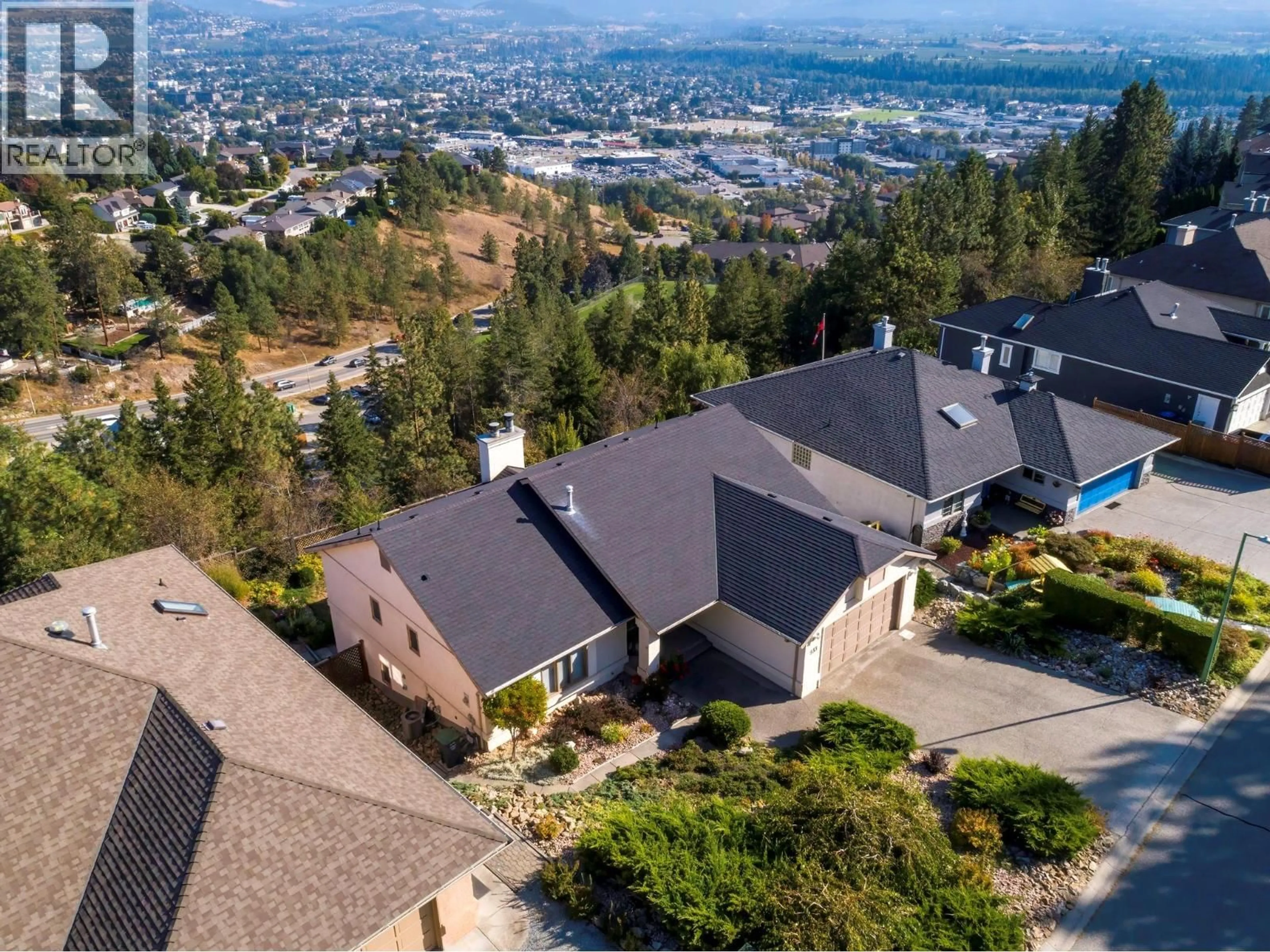 A pic from outside/outdoor area/front of a property/back of a property/a pic from drone, mountain view for 933 PURCELL DRIVE, Kelowna British Columbia V1V1N8