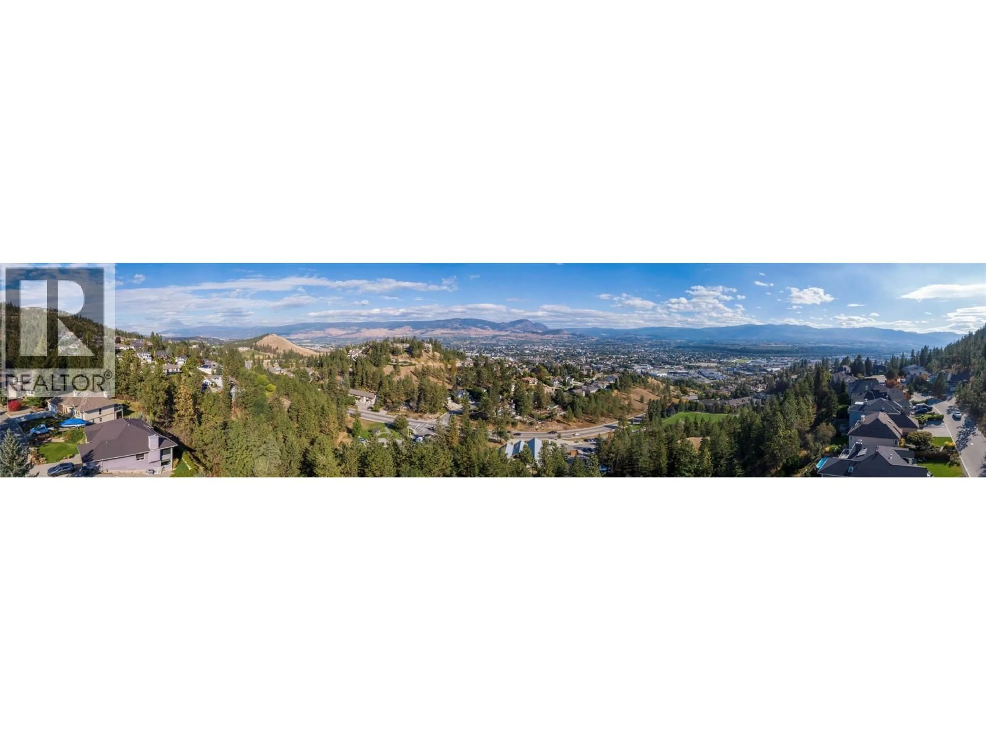 A pic from outside/outdoor area/front of a property/back of a property/a pic from drone, mountain view for 933 PURCELL DRIVE, Kelowna British Columbia V1V1N8