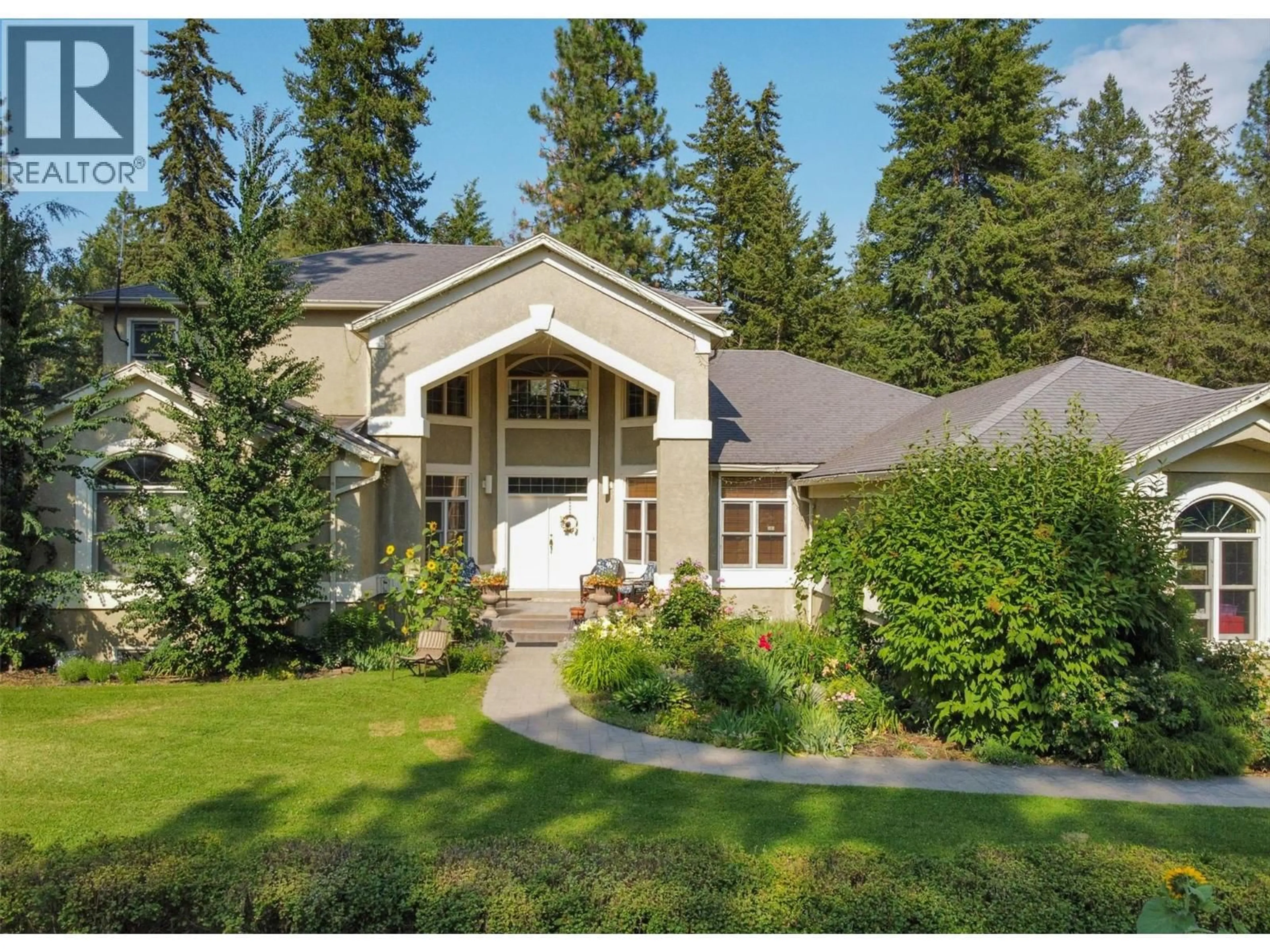 Home with vinyl exterior material, mountain view for 3605 LUXMOORE ROAD, Kelowna British Columbia V1W4C7