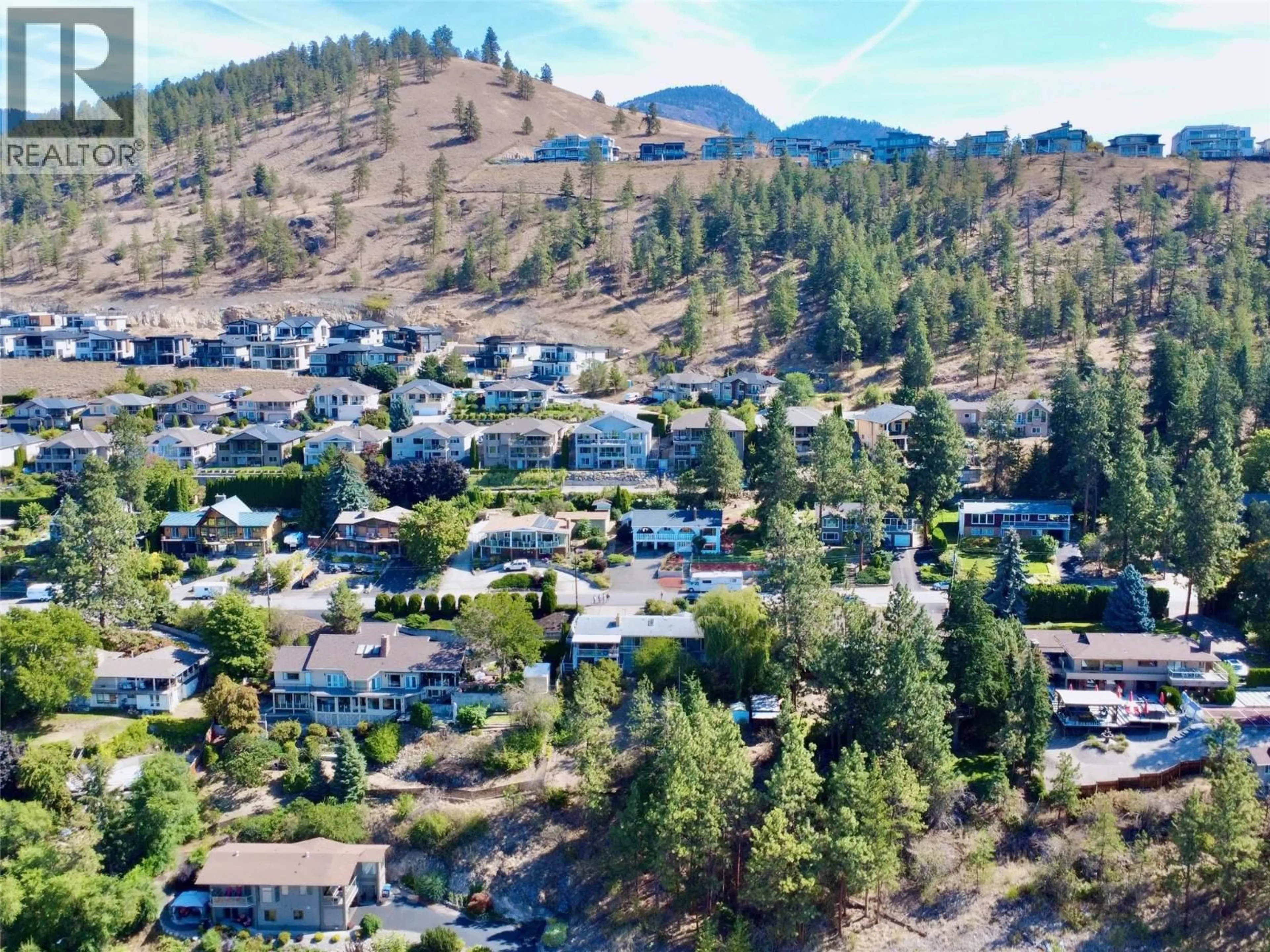 A pic from outside/outdoor area/front of a property/back of a property/a pic from drone, mountain view for 1030 TOOVEY ROAD, Kelowna British Columbia V1X6R1