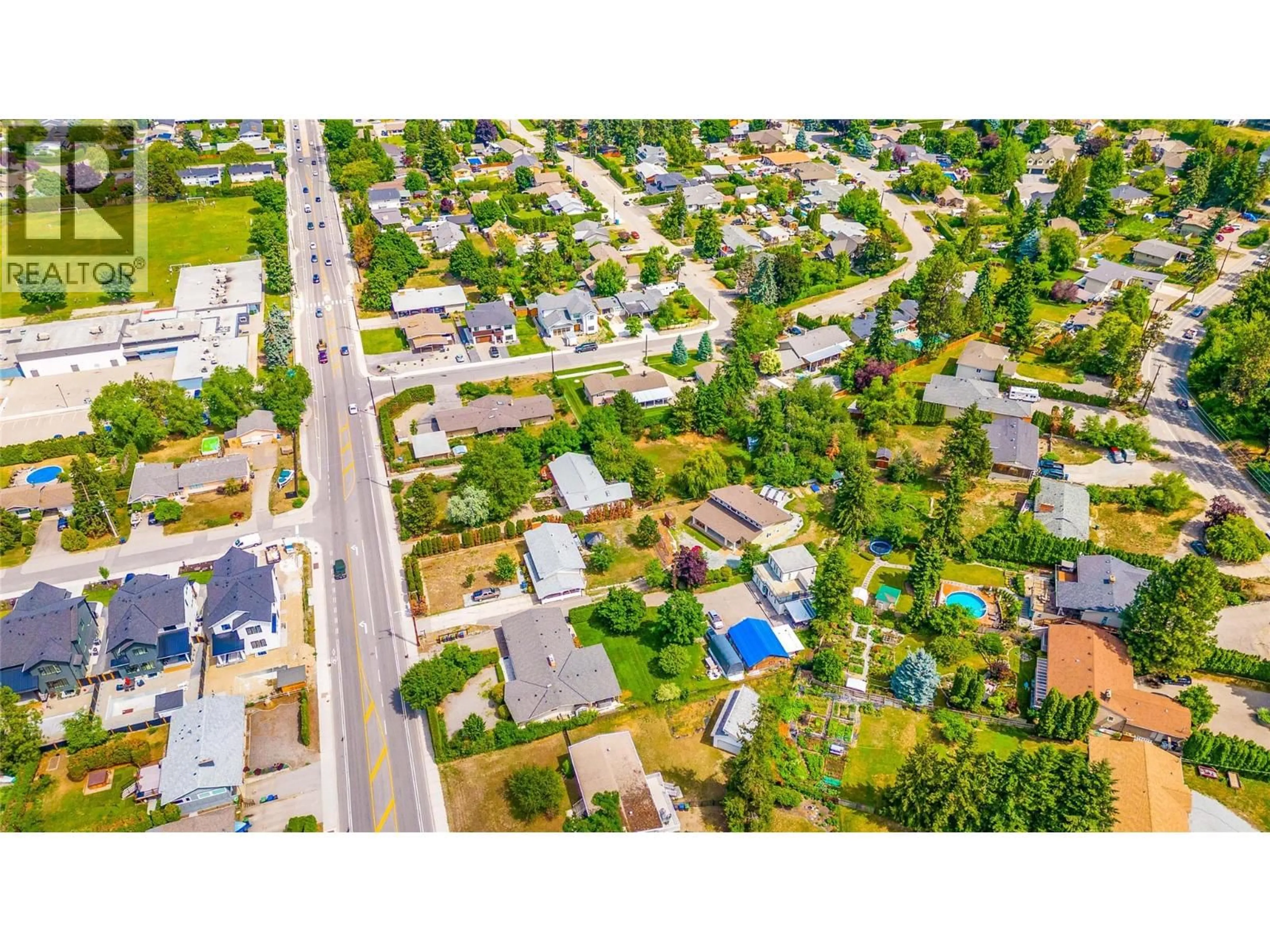 A pic from outside/outdoor area/front of a property/back of a property/a pic from drone, street for 4373 GORDON DRIVE, Kelowna British Columbia V1W1S7