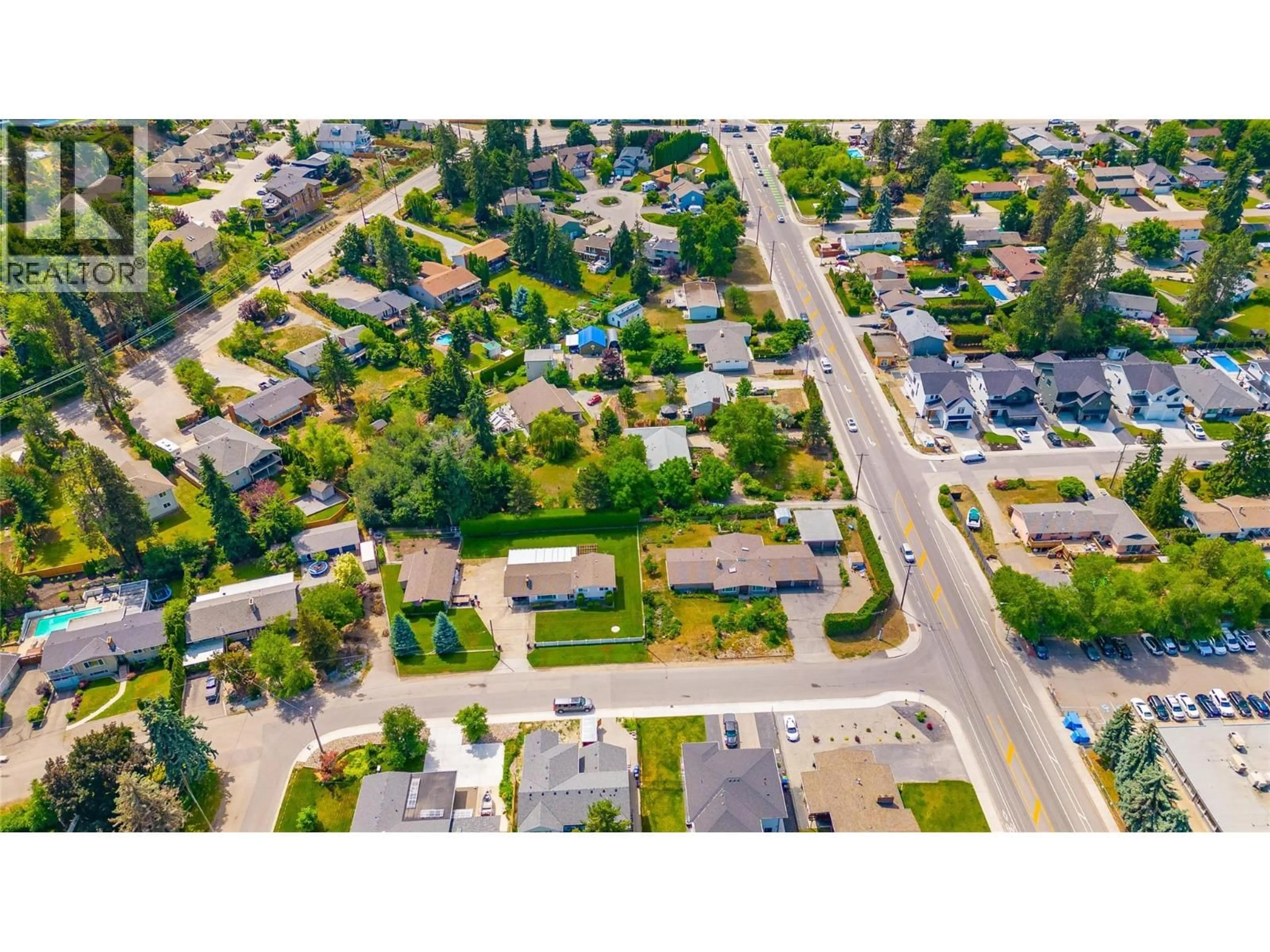 A pic from outside/outdoor area/front of a property/back of a property/a pic from drone, street for 4373 GORDON DRIVE, Kelowna British Columbia V1W1S7