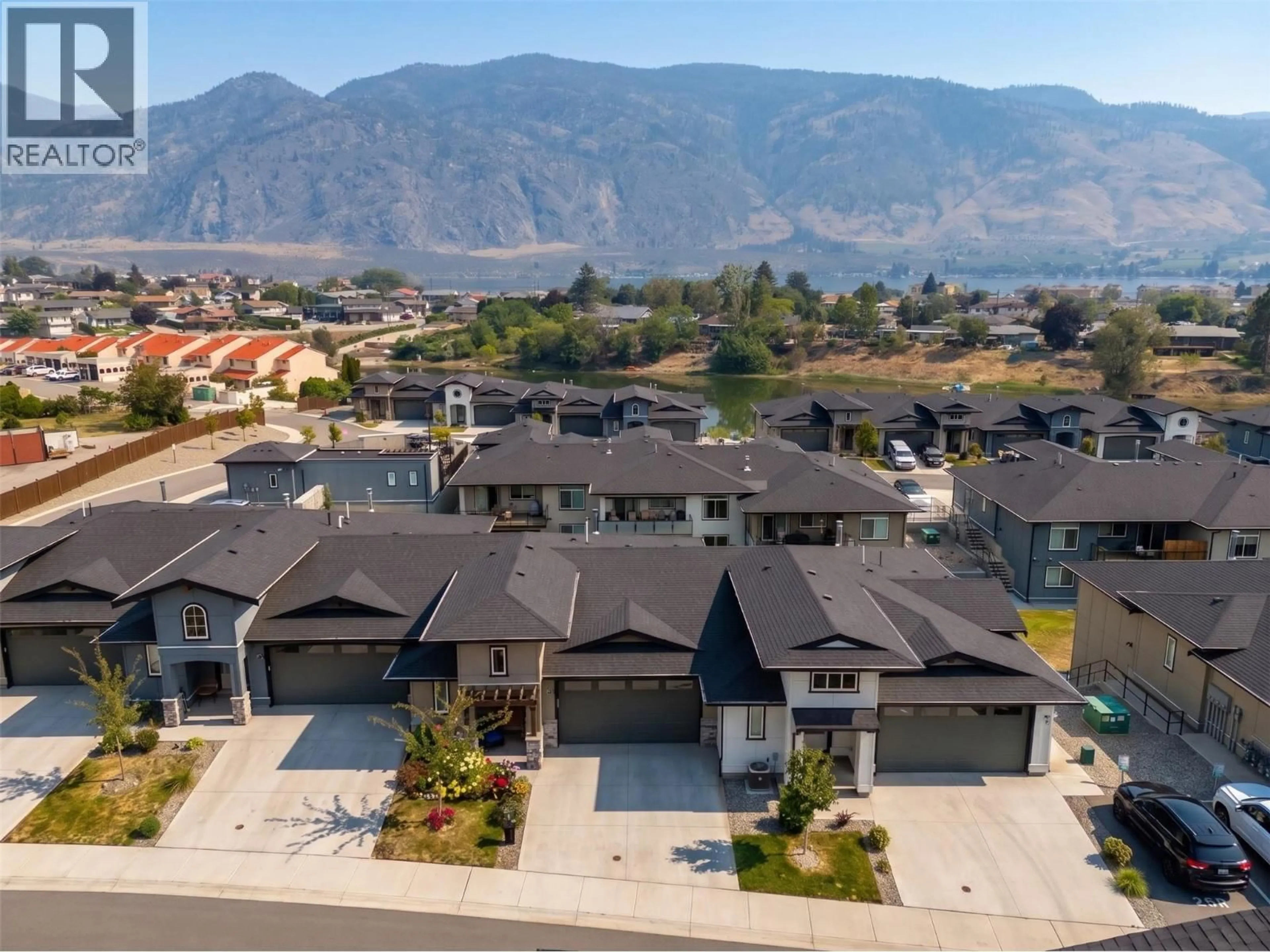 A pic from outside/outdoor area/front of a property/back of a property/a pic from drone, mountain view for 25 - 8000 VEDETTE DRIVE, Osoyoos British Columbia V0H1V2