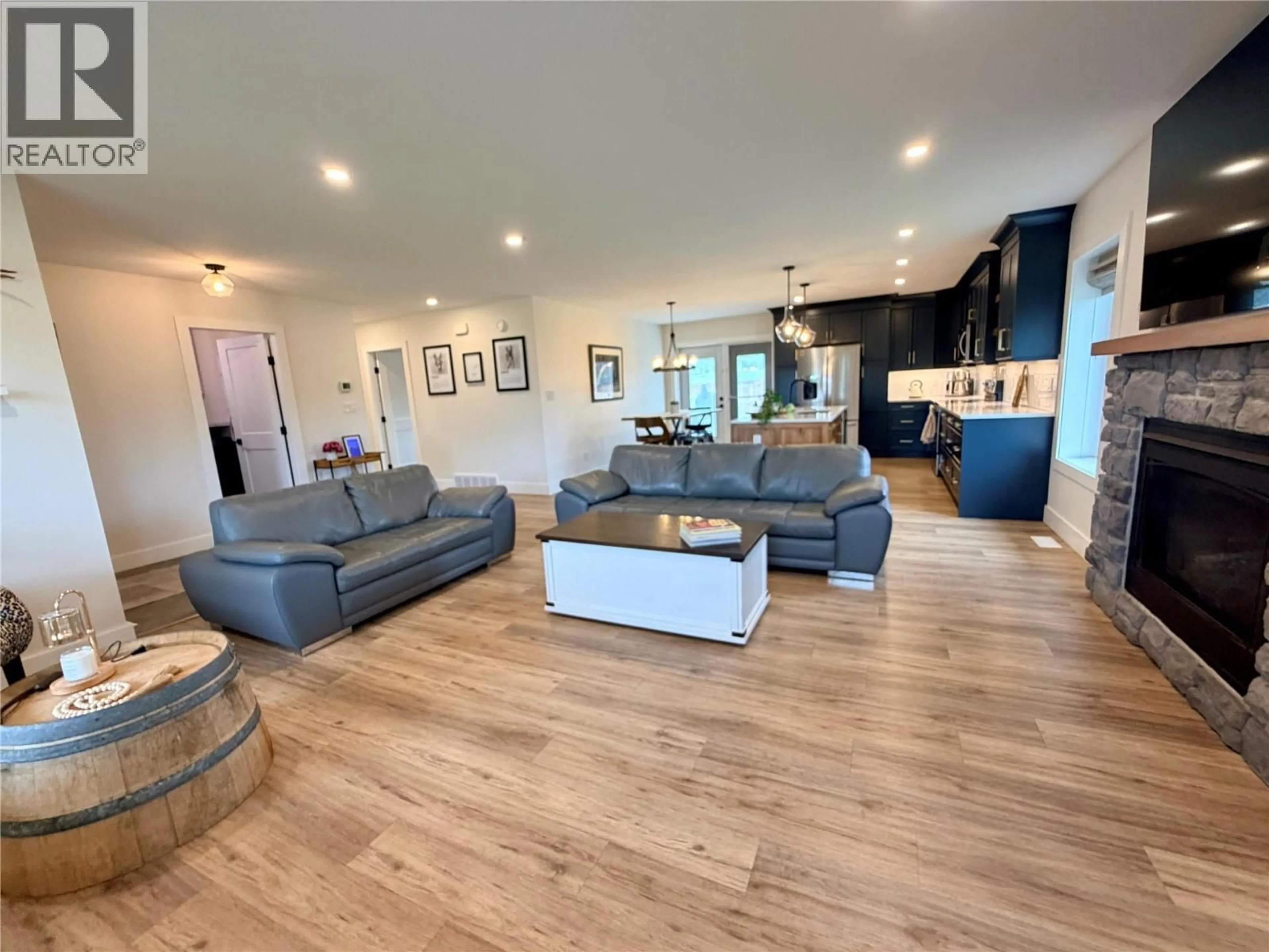 Living room with furniture, wood/laminate floor for 5308 49 STREET, Pouce Coupe British Columbia V0C2C0