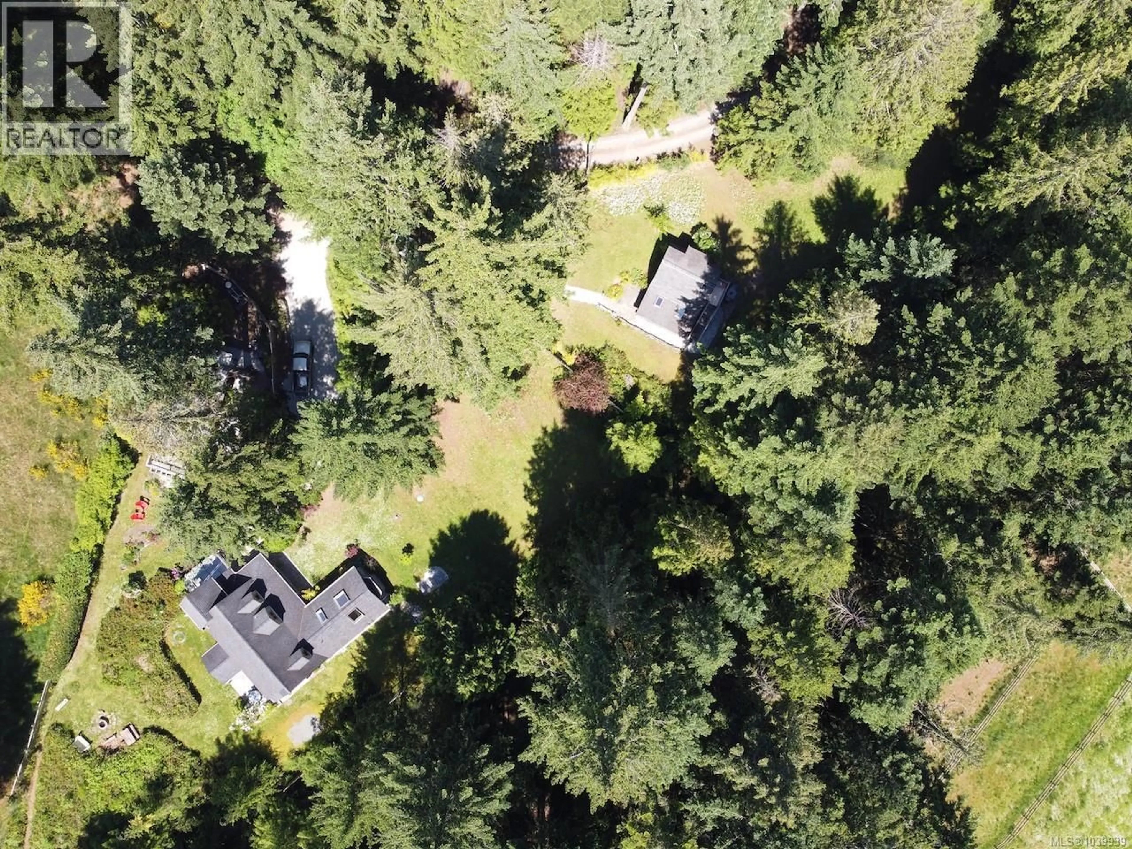 A pic from outside/outdoor area/front of a property/back of a property/a pic from drone, forest/trees view for 2254 NORTH END ROAD, Salt Spring British Columbia V8K1A7