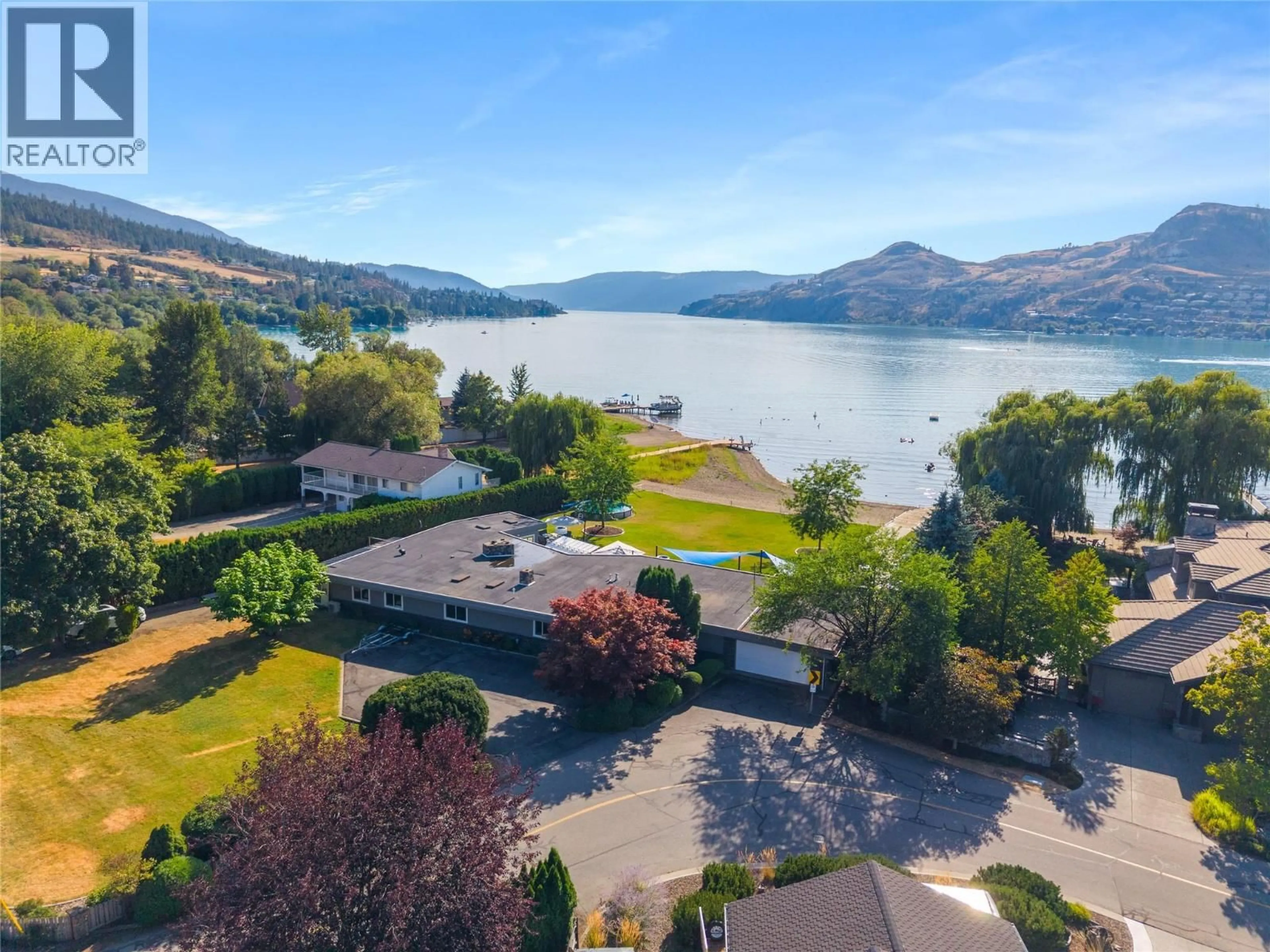A pic from outside/outdoor area/front of a property/back of a property/a pic from drone, water/lake/river/ocean view for 8104 KALAVISTA DRIVE, Coldstream British Columbia V1B1K3