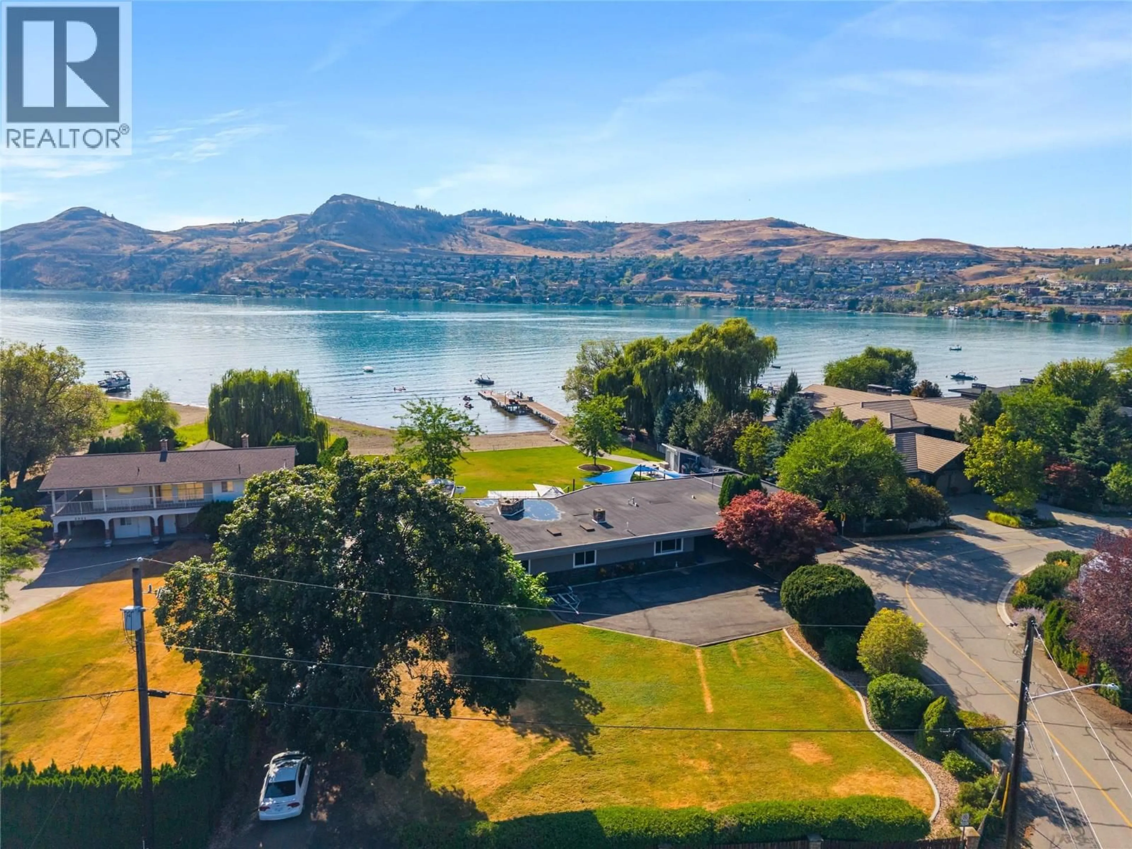 A pic from outside/outdoor area/front of a property/back of a property/a pic from drone, water/lake/river/ocean view for 8104 KALAVISTA DRIVE, Coldstream British Columbia V1B1K3