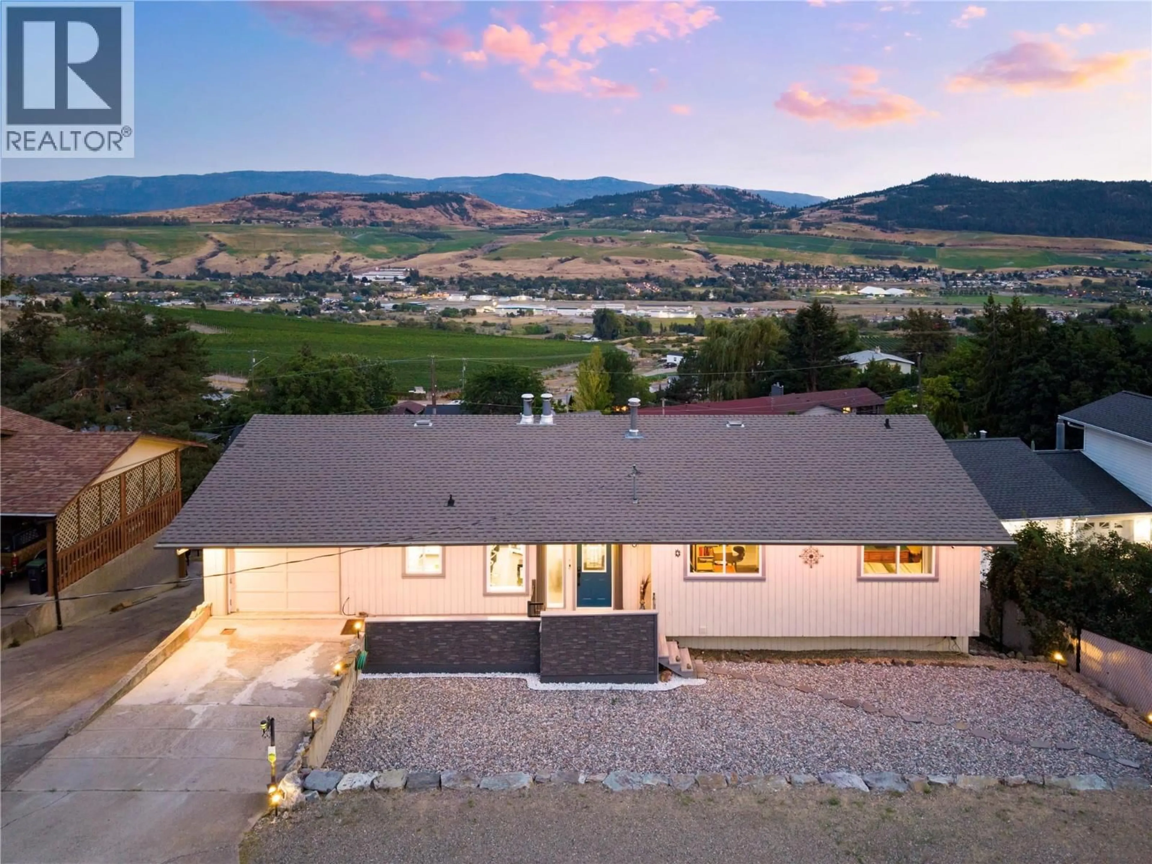 A pic from outside/outdoor area/front of a property/back of a property/a pic from drone, mountain view for 6636 SOUTHWIND ROAD, Vernon British Columbia V1H1B7