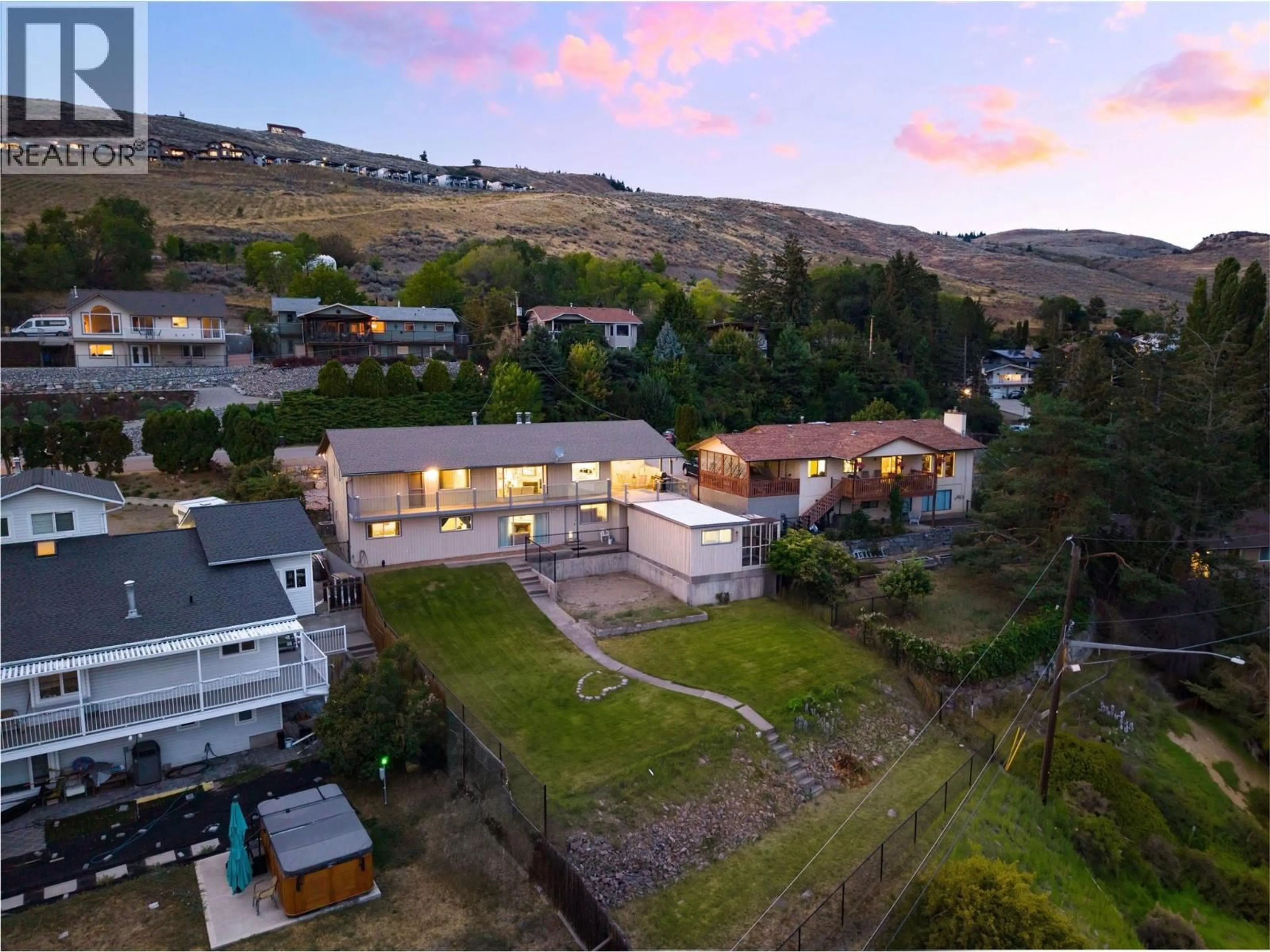 A pic from outside/outdoor area/front of a property/back of a property/a pic from drone, mountain view for 6636 SOUTHWIND ROAD, Vernon British Columbia V1H1B7