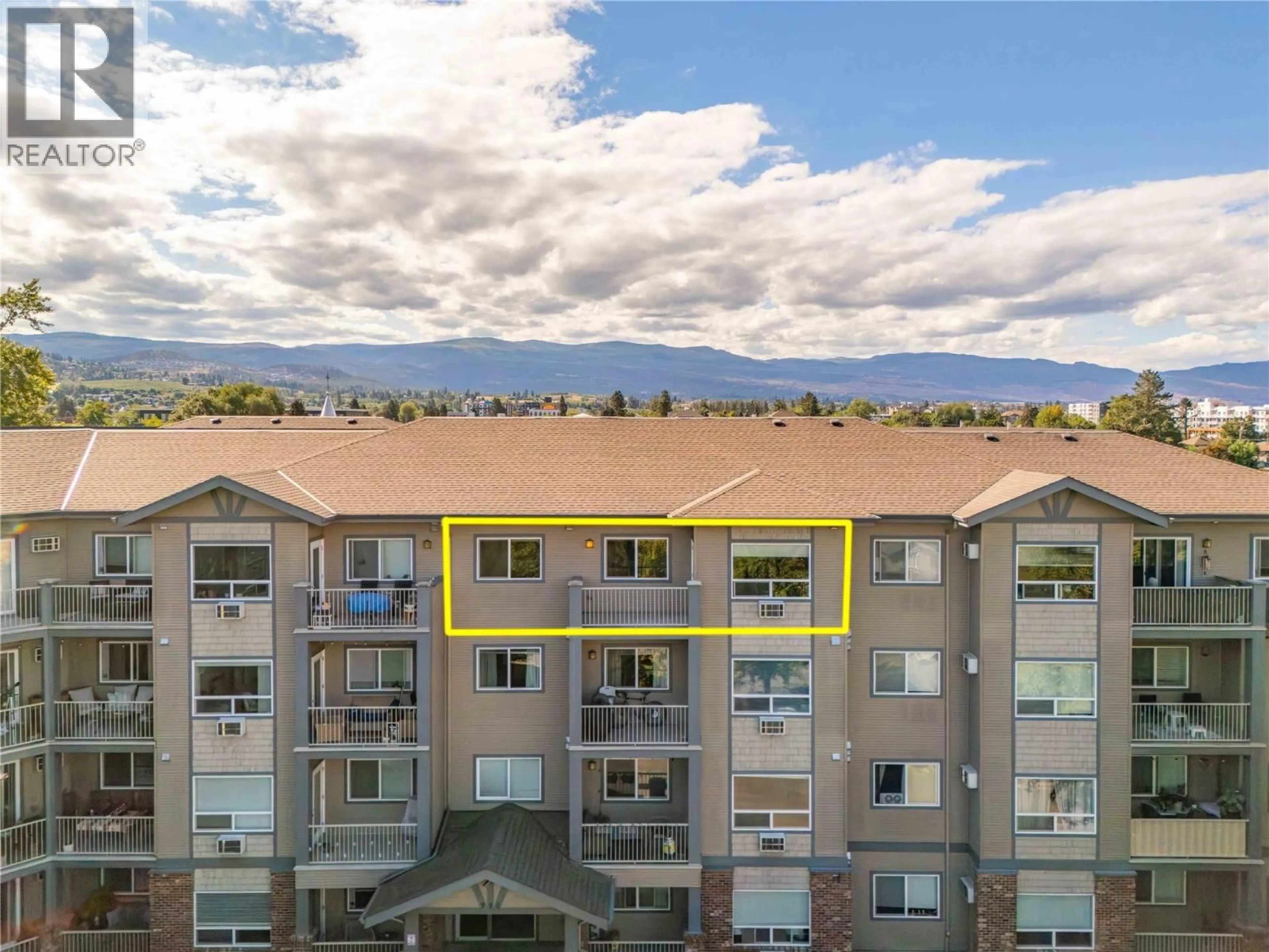 A pic from outside/outdoor area/front of a property/back of a property/a pic from drone, mountain view for 401 - 770 RUTLAND ROAD NORTH, Kelowna British Columbia V1X3B7
