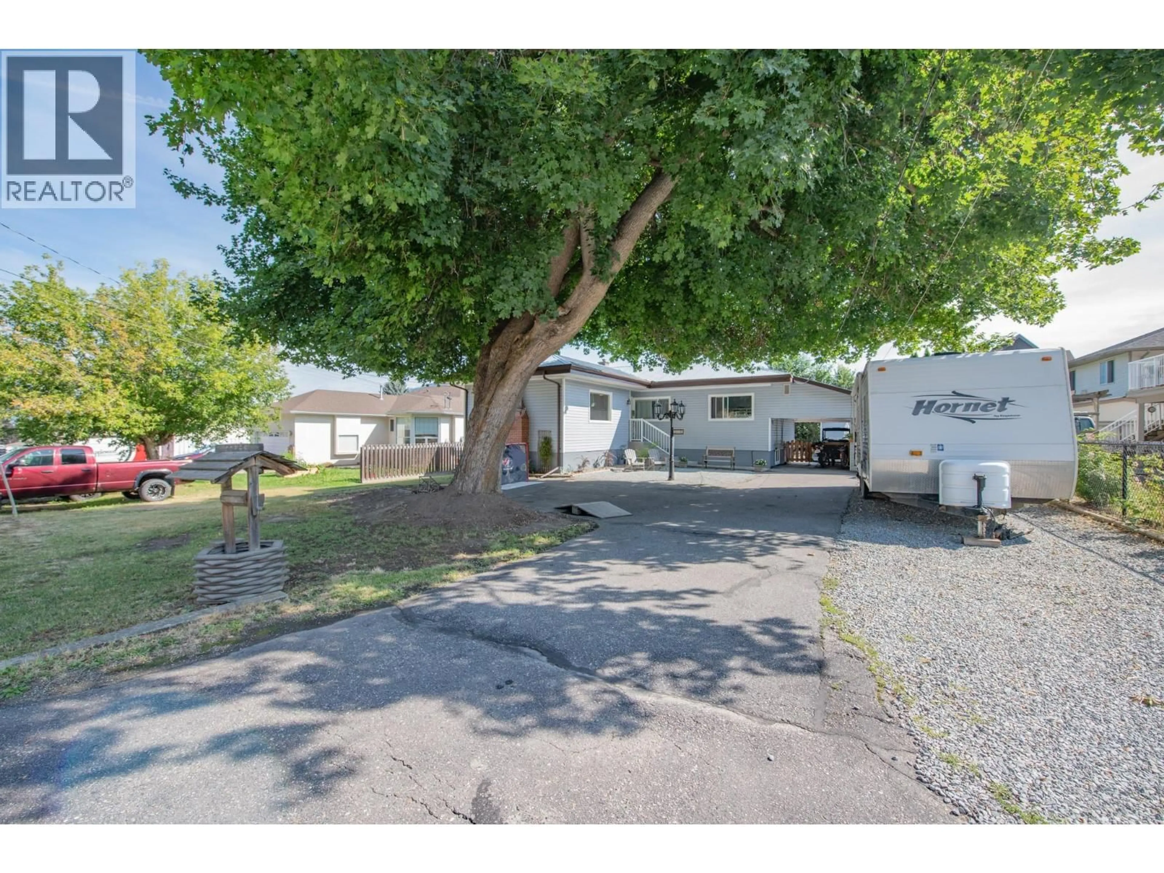 A pic from outside/outdoor area/front of a property/back of a property/a pic from drone, street for 106 WEST ENDERBY ROAD, Enderby British Columbia V0E1V1