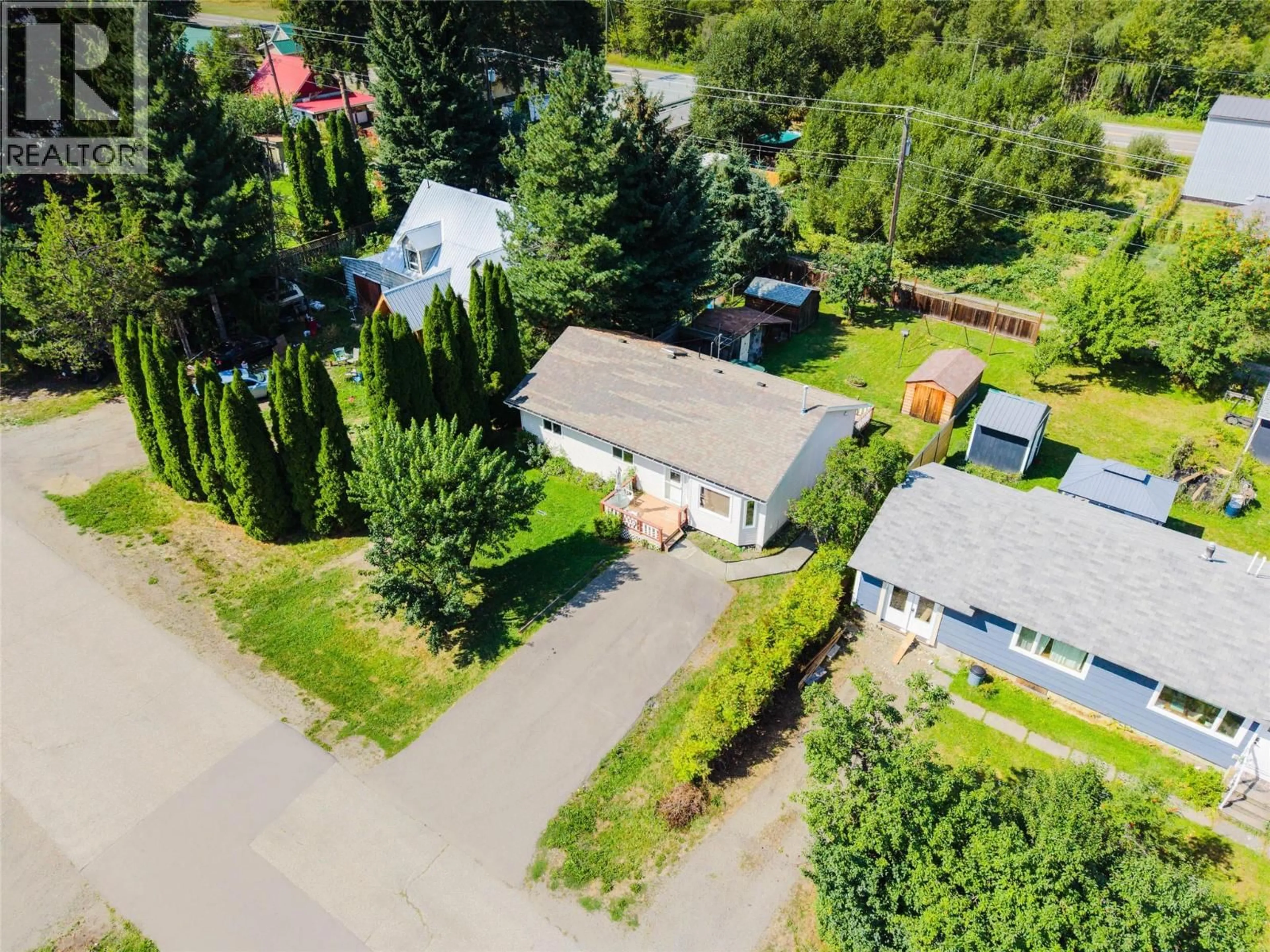 A pic from outside/outdoor area/front of a property/back of a property/a pic from drone, street for 110 DAVIES AVENUE, Salmo British Columbia V0G1Z0