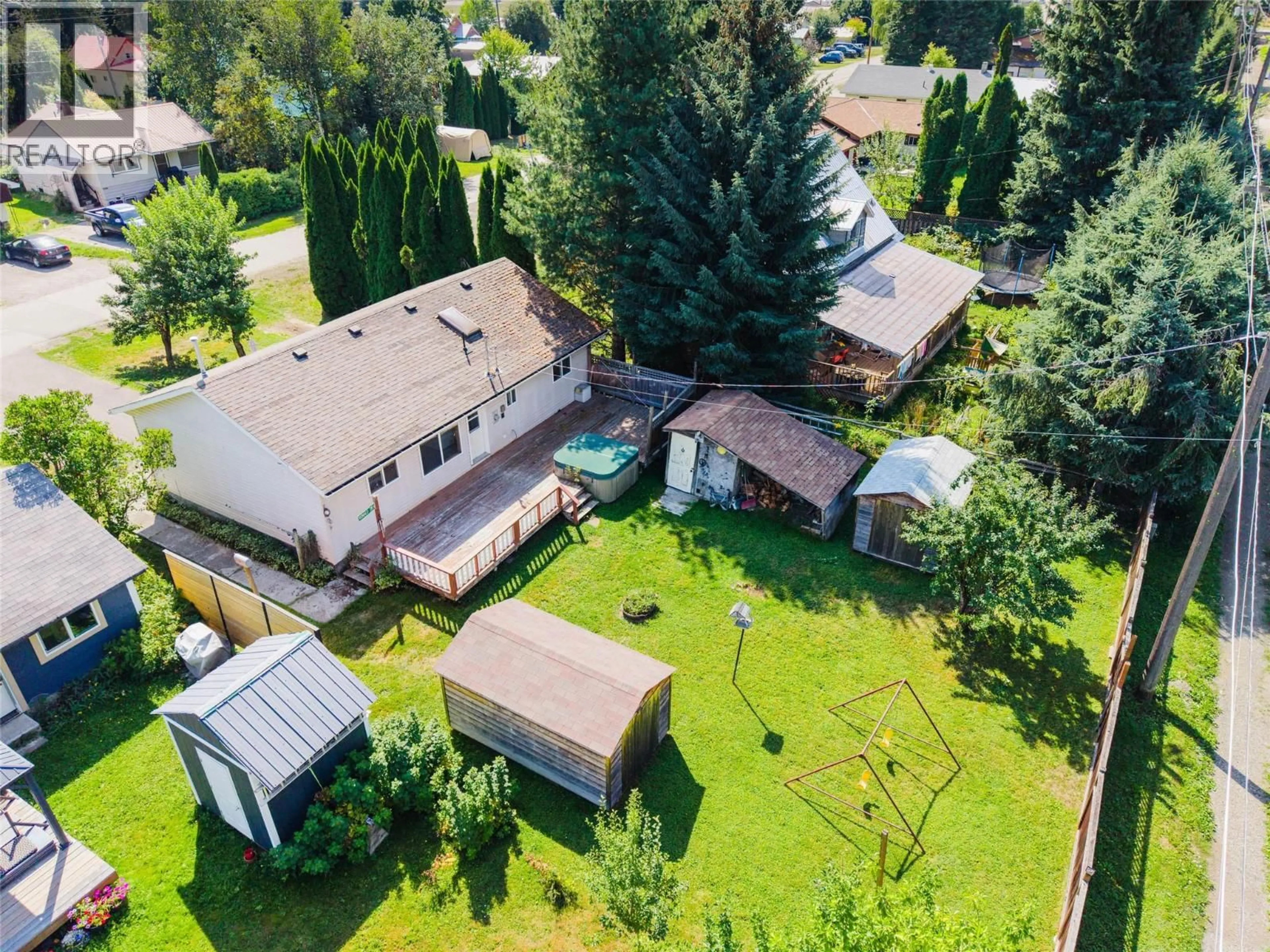 A pic from outside/outdoor area/front of a property/back of a property/a pic from drone, street for 110 DAVIES AVENUE, Salmo British Columbia V0G1Z0