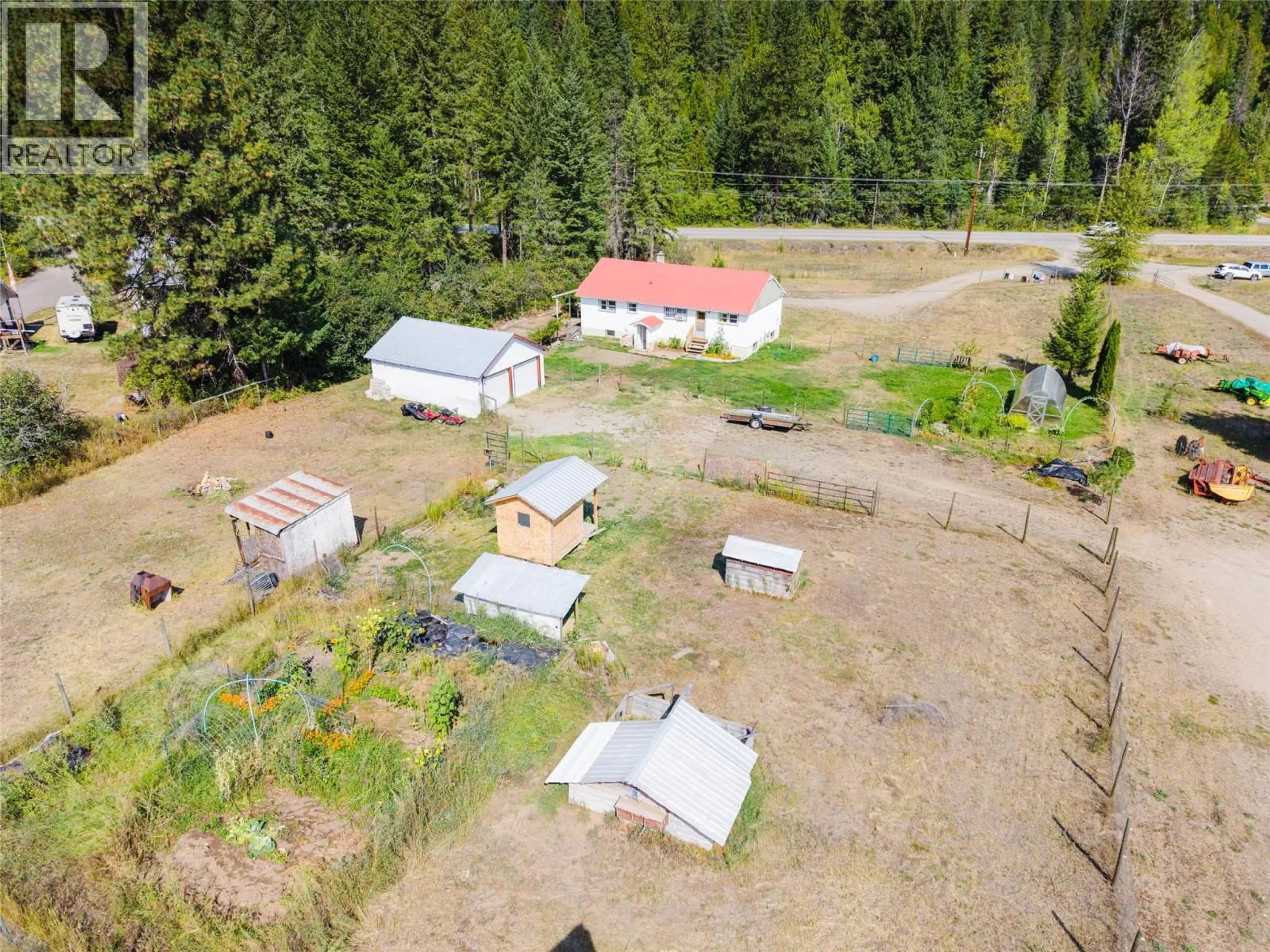 A pic from outside/outdoor area/front of a property/back of a property/a pic from drone, unknown for 6352 HIGHWAY 3 HIGHWAY, Salmo British Columbia V0G1Z0