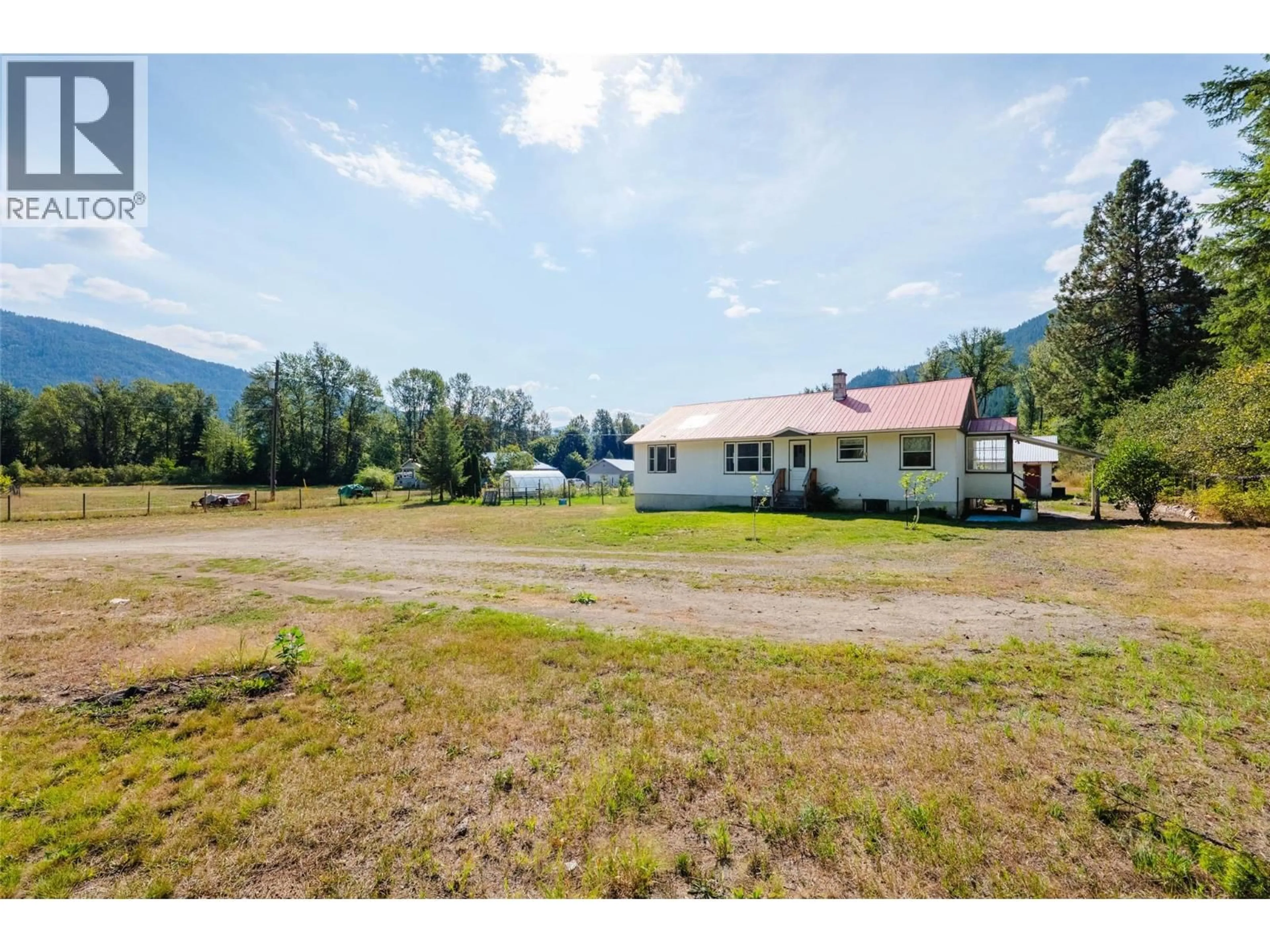 A pic from outside/outdoor area/front of a property/back of a property/a pic from drone, mountain view for 6352 HIGHWAY 3 HIGHWAY, Salmo British Columbia V0G1Z0