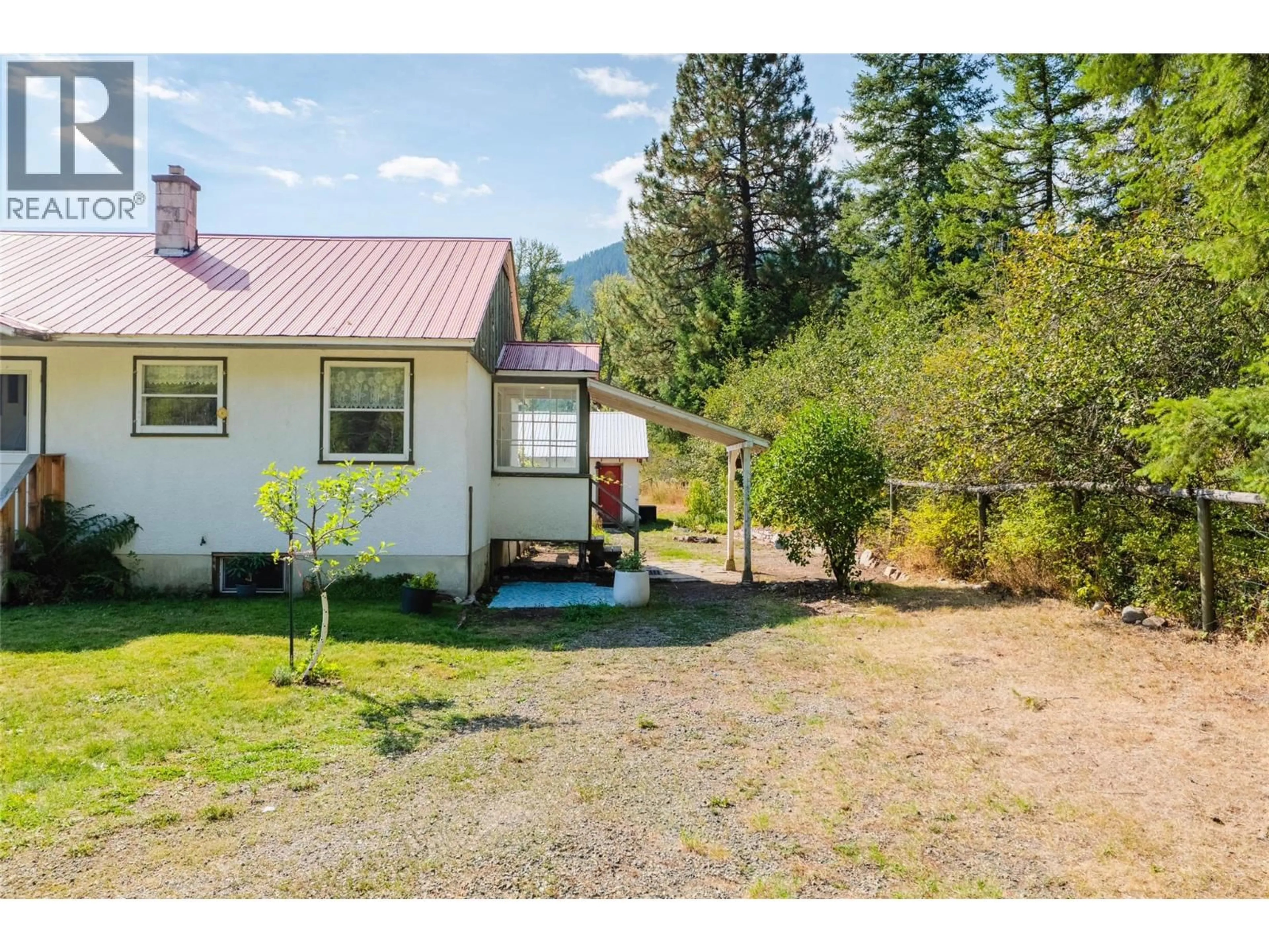 A pic from outside/outdoor area/front of a property/back of a property/a pic from drone, mountain view for 6352 HIGHWAY 3 HIGHWAY, Salmo British Columbia V0G1Z0
