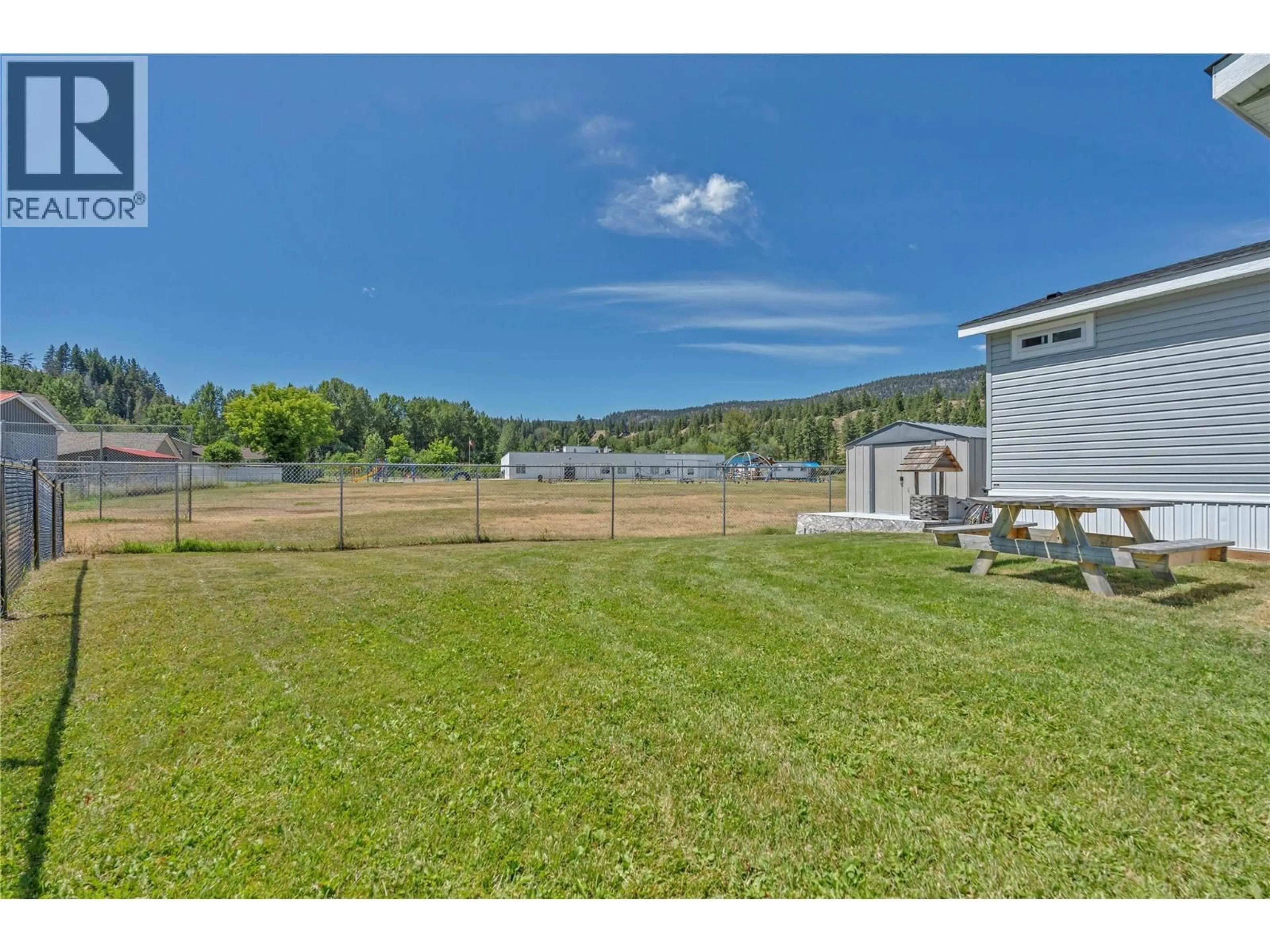 A pic from outside/outdoor area/front of a property/back of a property/a pic from drone, water/lake/river/ocean view for 33 - 473 CORINA AVE OTHER, Princeton British Columbia V0X1W0