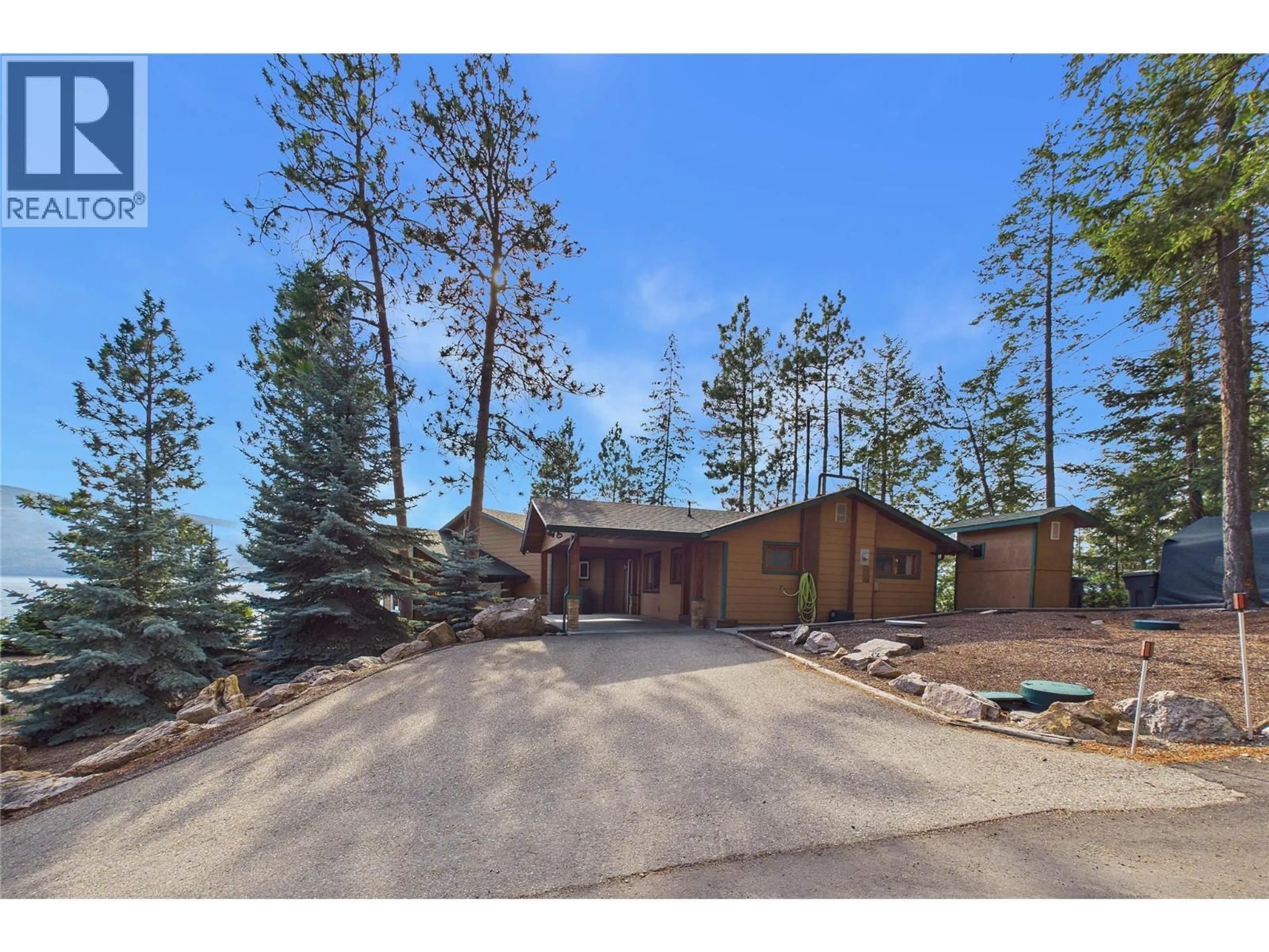 A pic from outside/outdoor area/front of a property/back of a property/a pic from drone, mountain view for 17538 CORAL BEACH ROAD, Lake Country British Columbia V4V1C1
