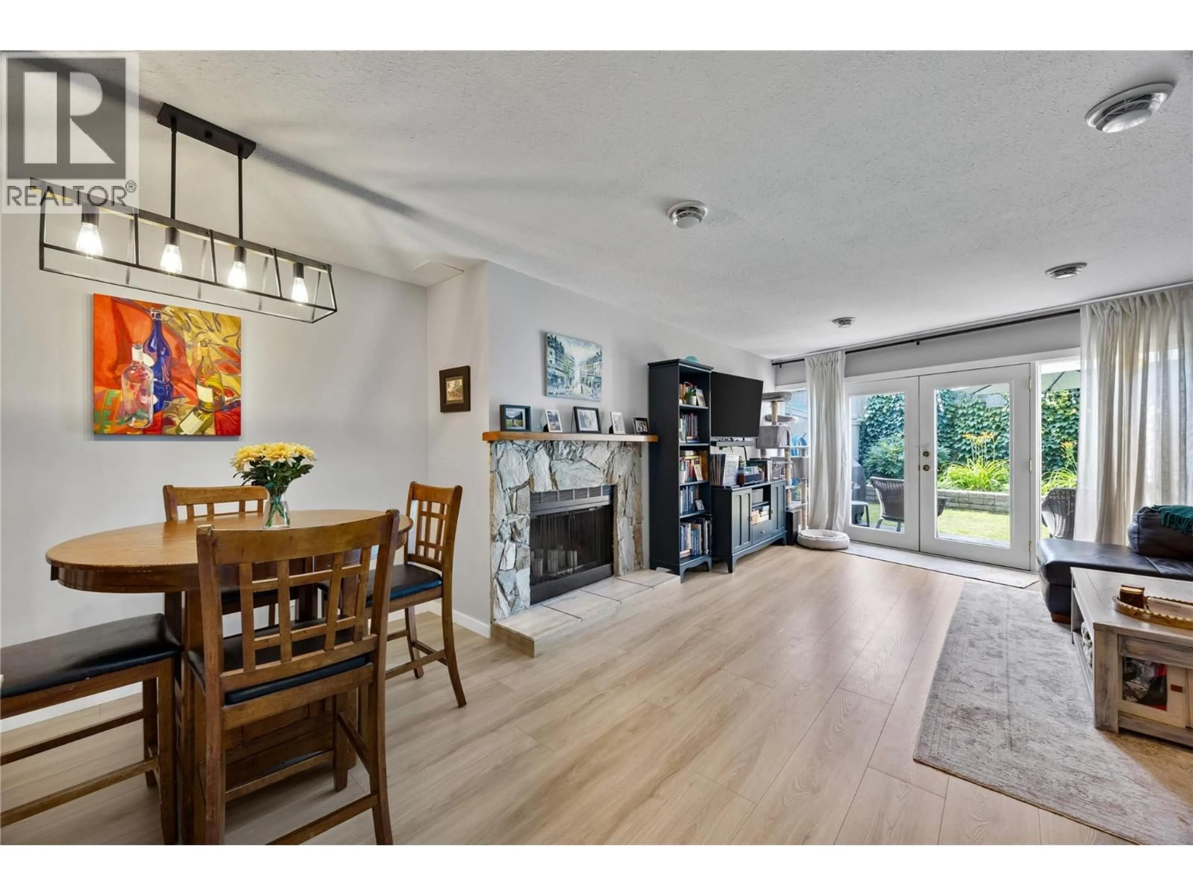 Open concept kitchen, wood/laminate floor for 40 - 145 NICOLA STREET, Kamloops British Columbia V2C2P2