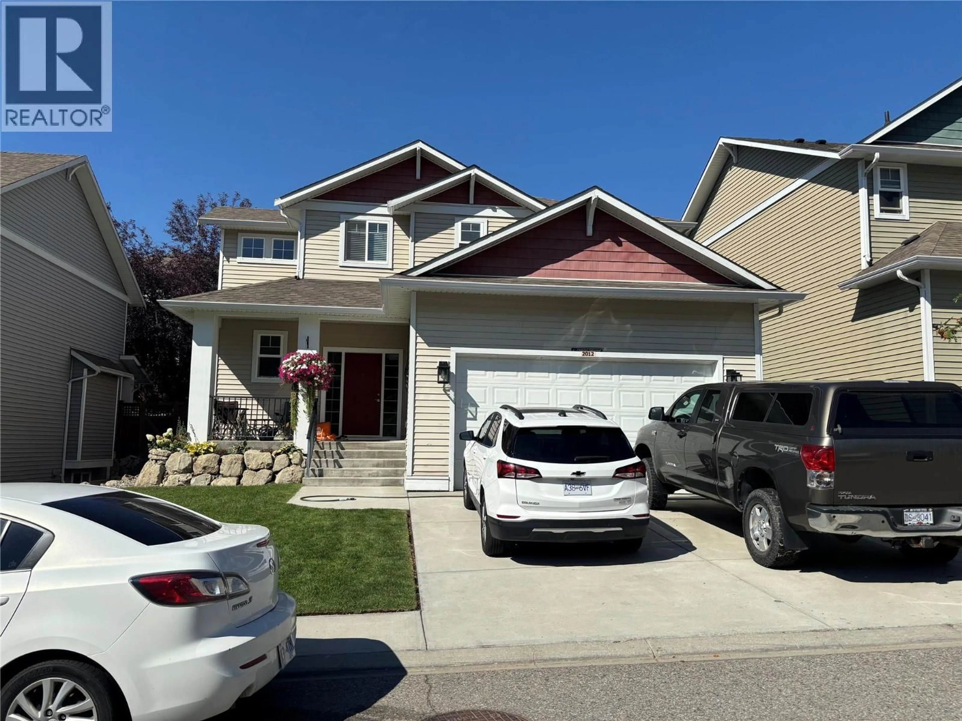 Home with vinyl exterior material, street for 2012 ELKRIDGE DRIVE, West Kelowna British Columbia V4T3J8