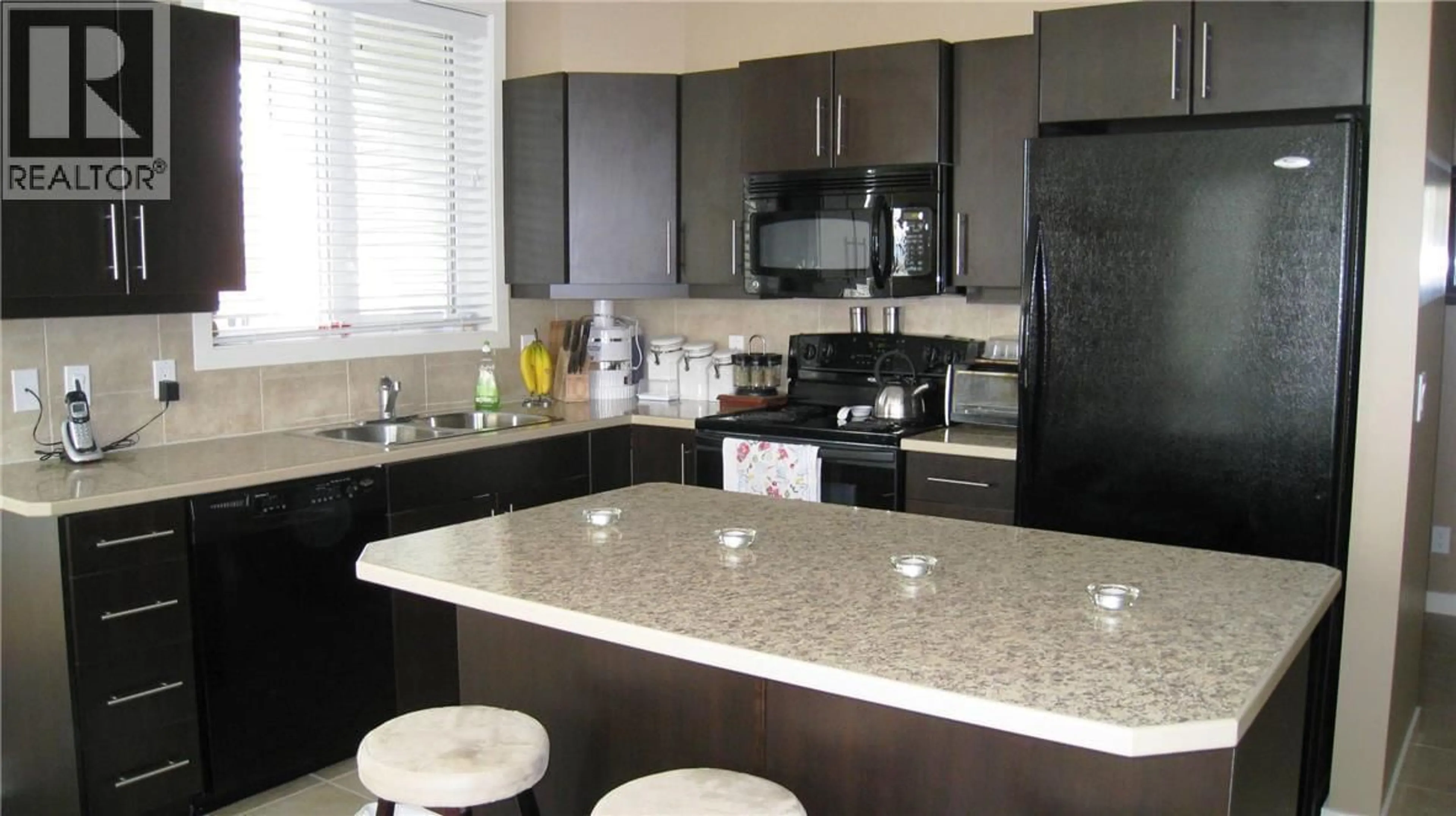 Open concept kitchen, unknown for 102 - 130 BARBER ROAD, Kelowna British Columbia V1X3V4