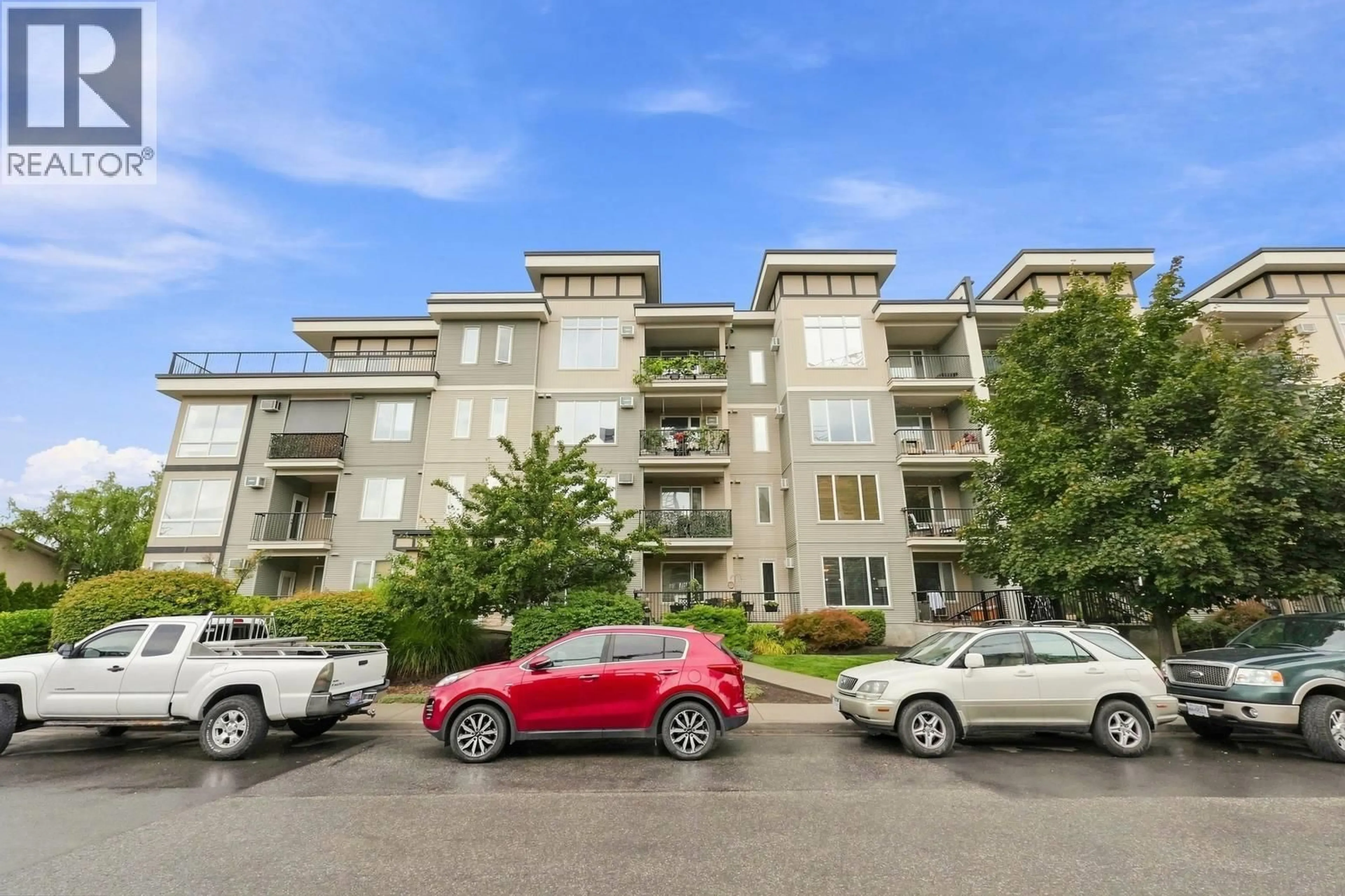 A pic from outside/outdoor area/front of a property/back of a property/a pic from drone, unknown for 102 - 130 BARBER ROAD, Kelowna British Columbia V1X3V4