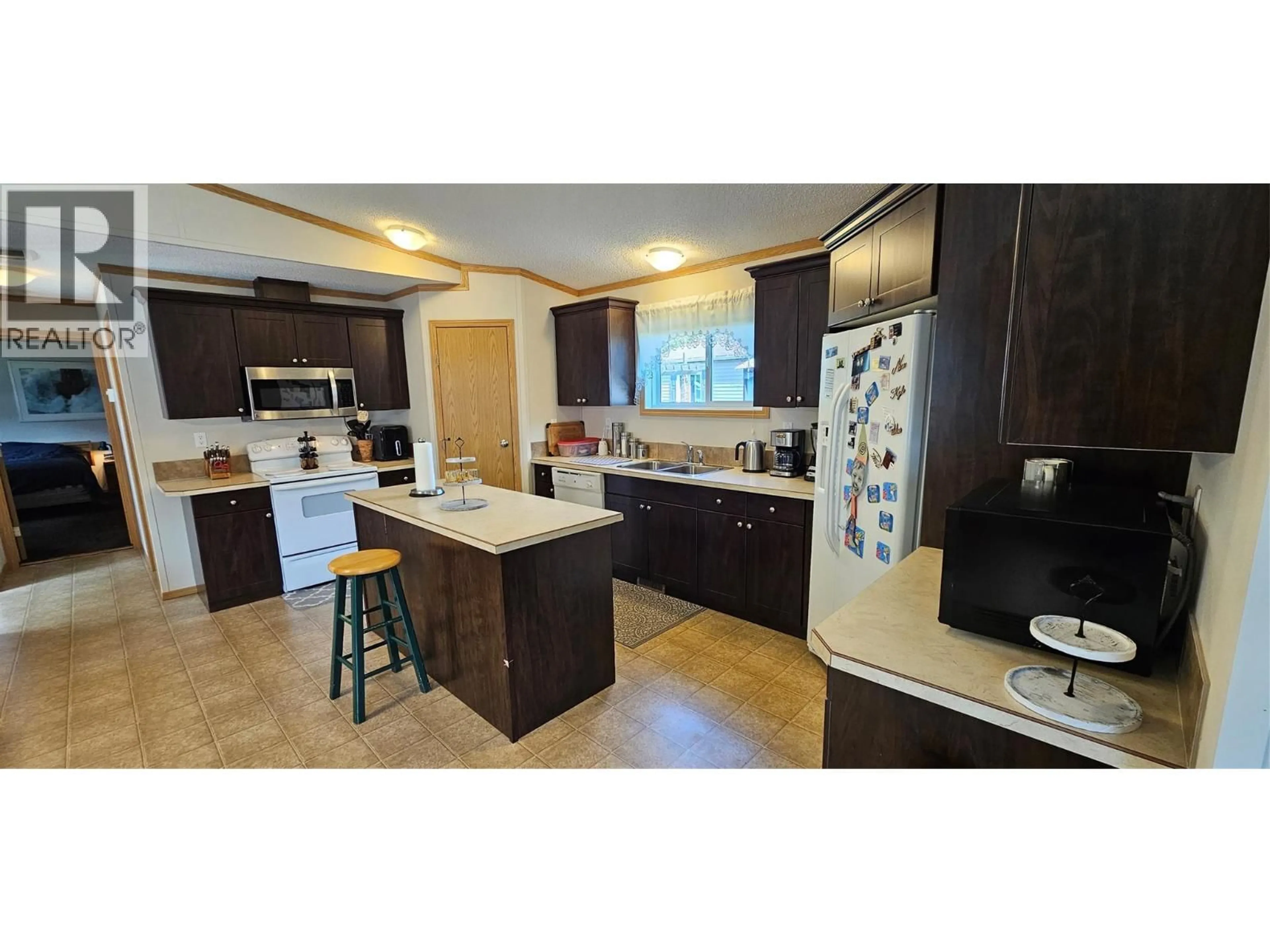 Open concept kitchen, ceramic/tile floor for 151 - 100 ASPEN DRIVE, Sparwood British Columbia V0B2G0