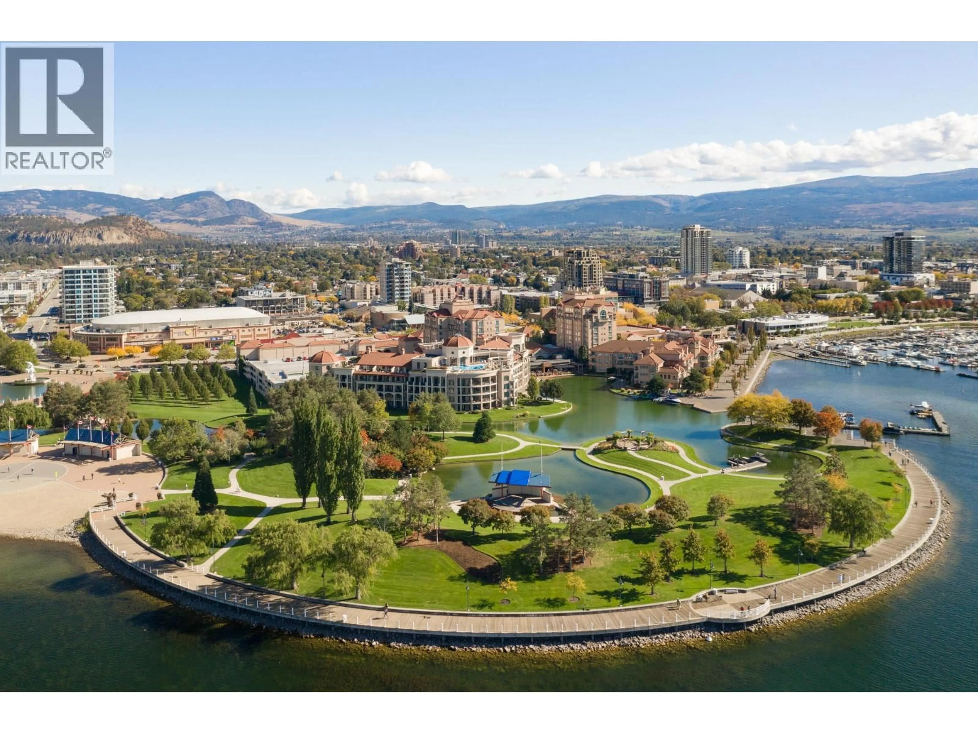 A pic from outside/outdoor area/front of a property/back of a property/a pic from drone, water/lake/river/ocean view for 427 - 1088 SUNSET DRIVE, Kelowna British Columbia V1Y9W1