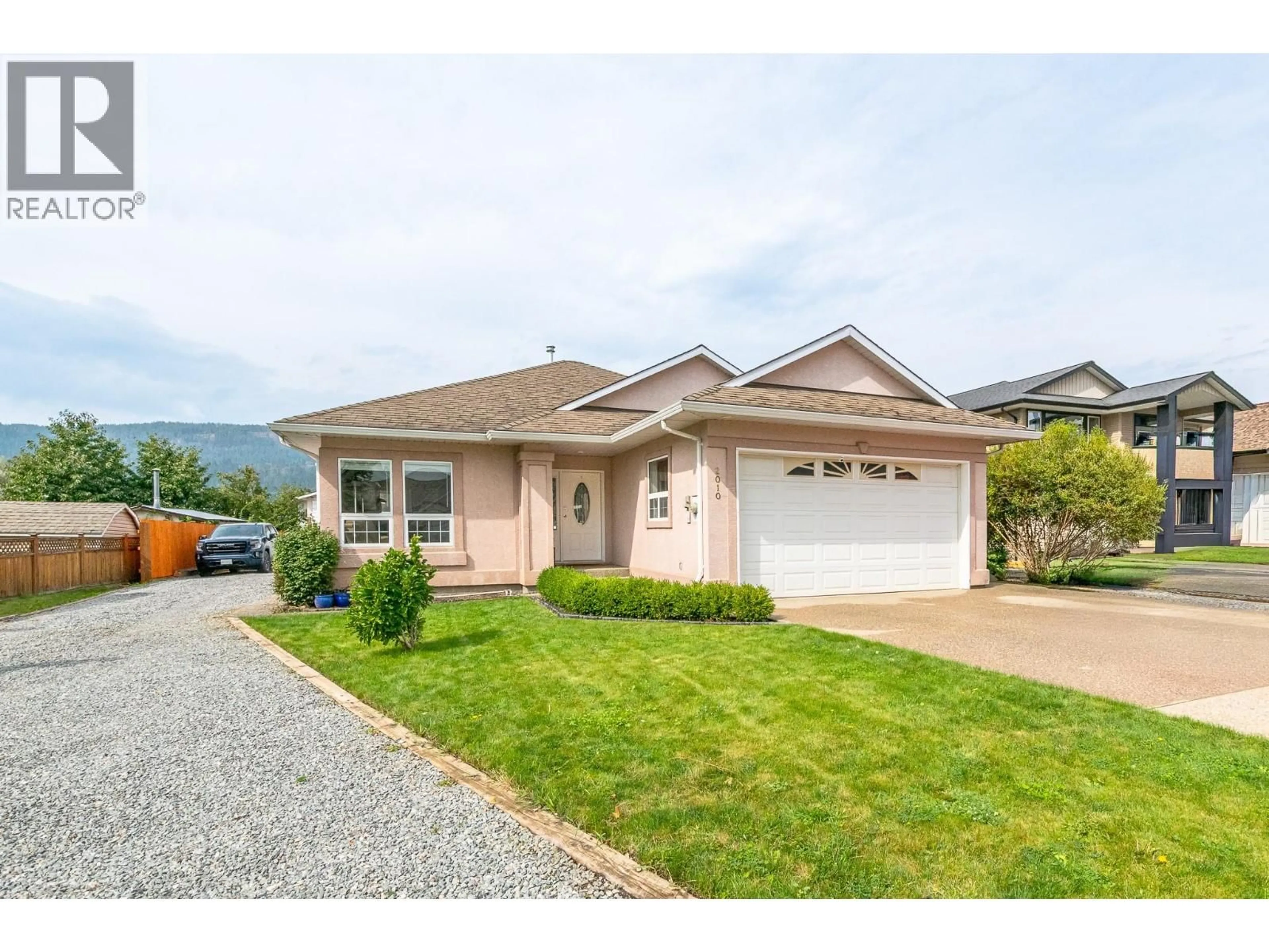 Home with vinyl exterior material, street for 2010 HEITMAN STREET, Enderby British Columbia V0E1V2