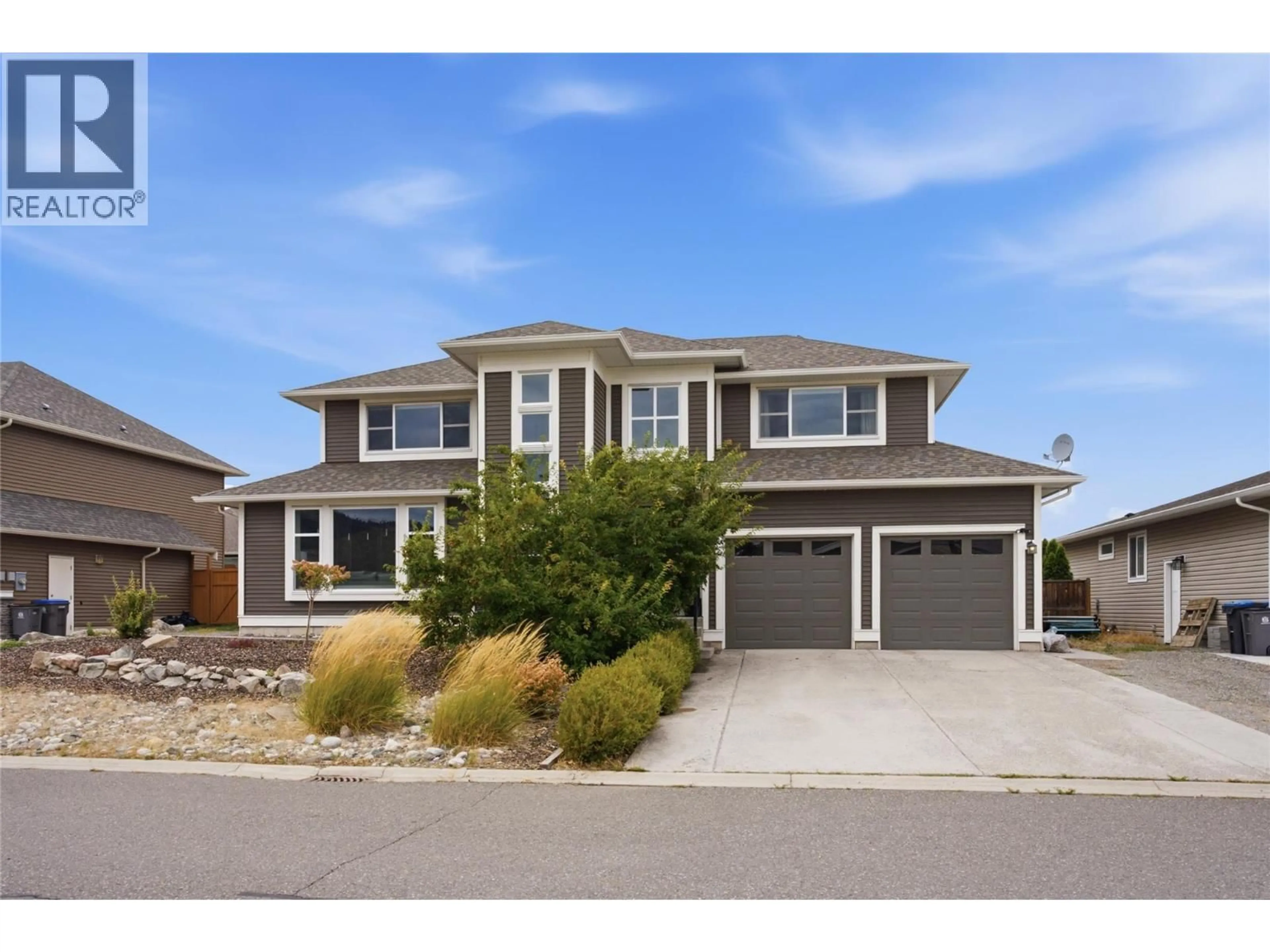 Home with vinyl exterior material, street for 1551 COWAN WAY, Merritt British Columbia V1K1B8