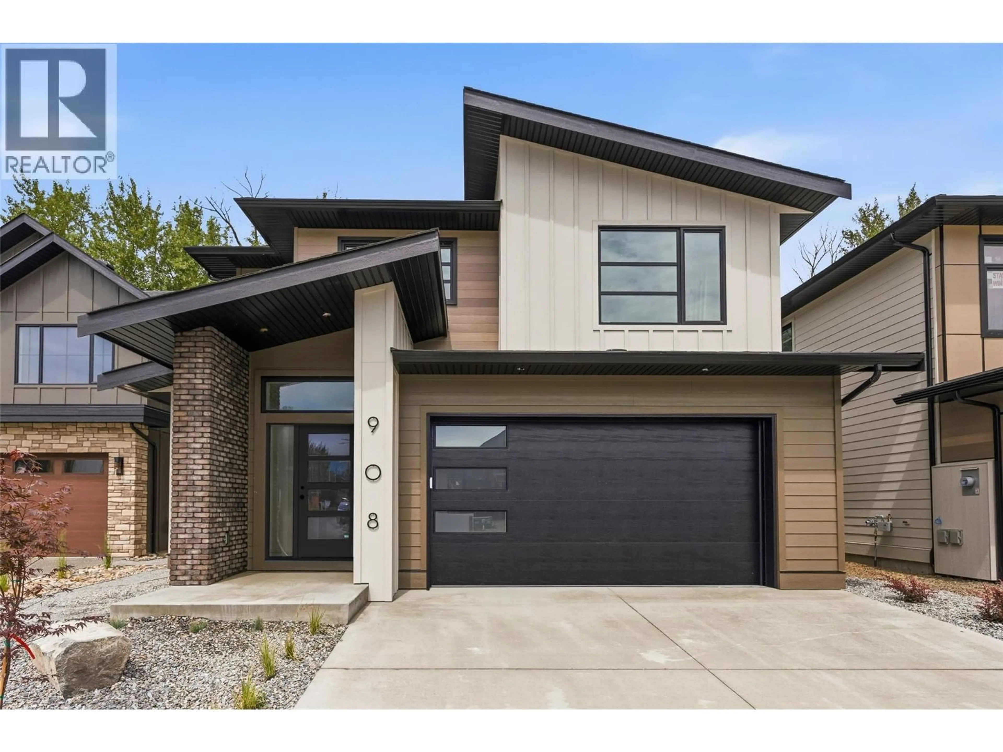 Home with brick exterior material, street for 908 BULL CRESCENT, Kelowna British Columbia V1W4N2