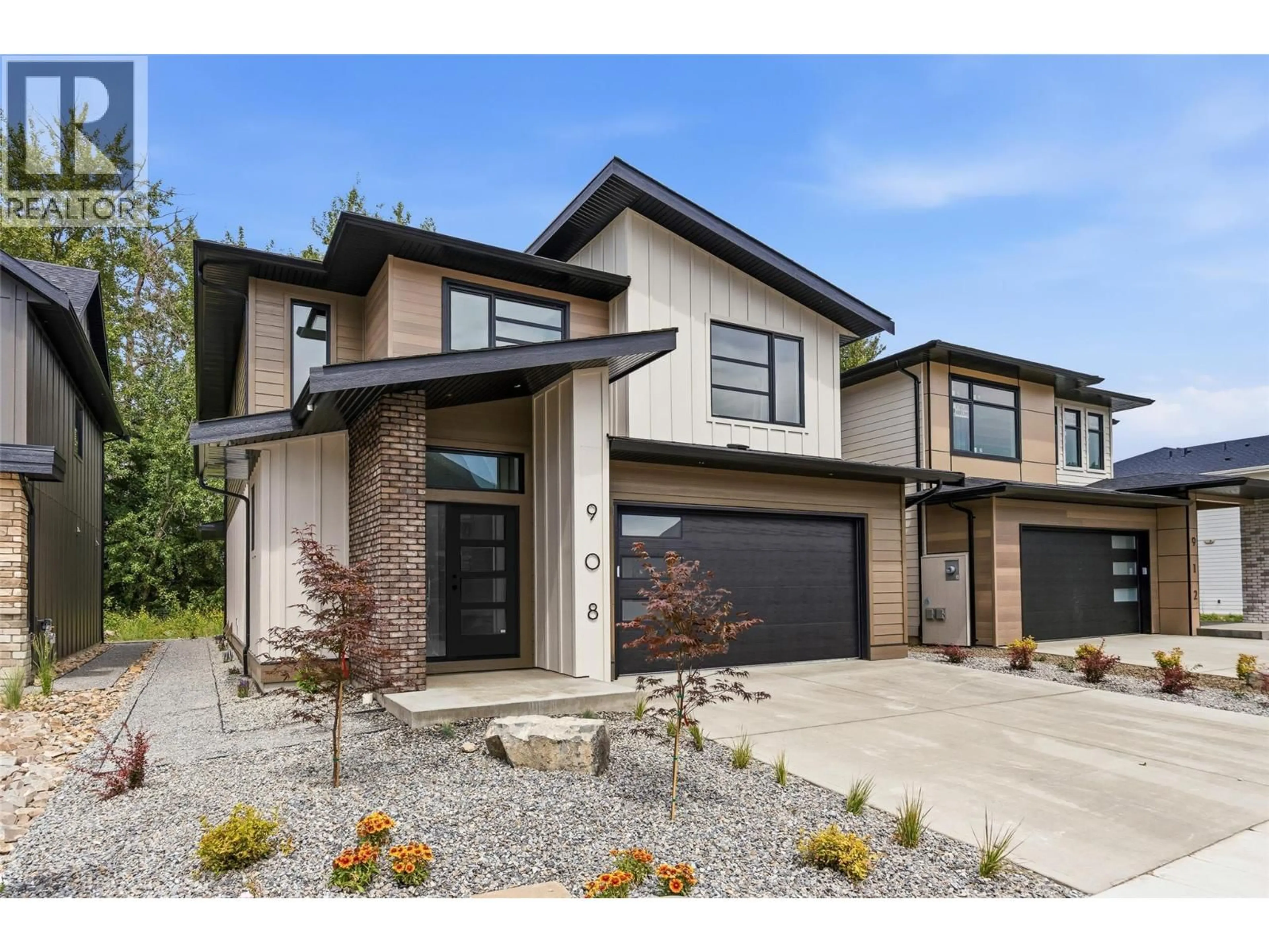 Home with brick exterior material, street for 908 BULL CRESCENT, Kelowna British Columbia V1W4N2