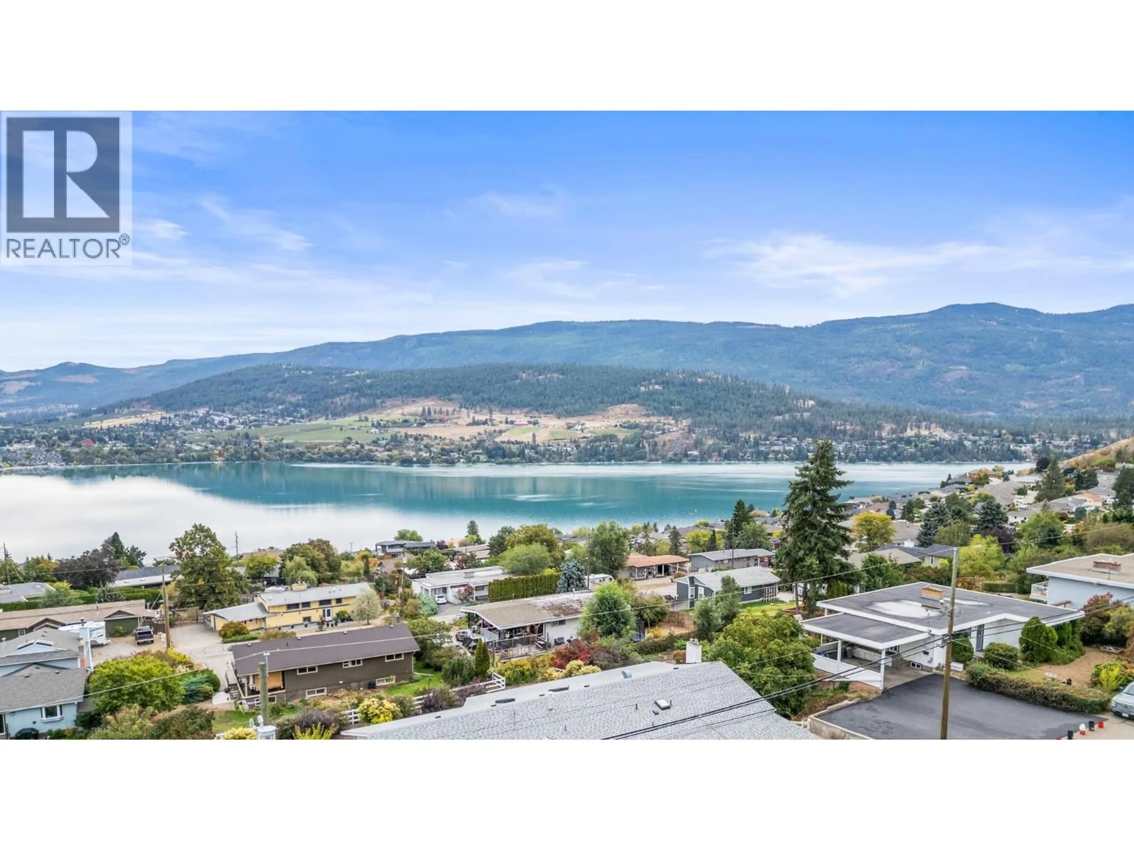 A pic from outside/outdoor area/front of a property/back of a property/a pic from drone, water/lake/river/ocean view for 8404 LAKEVIEW DRIVE, Coldstream British Columbia V1B1W3