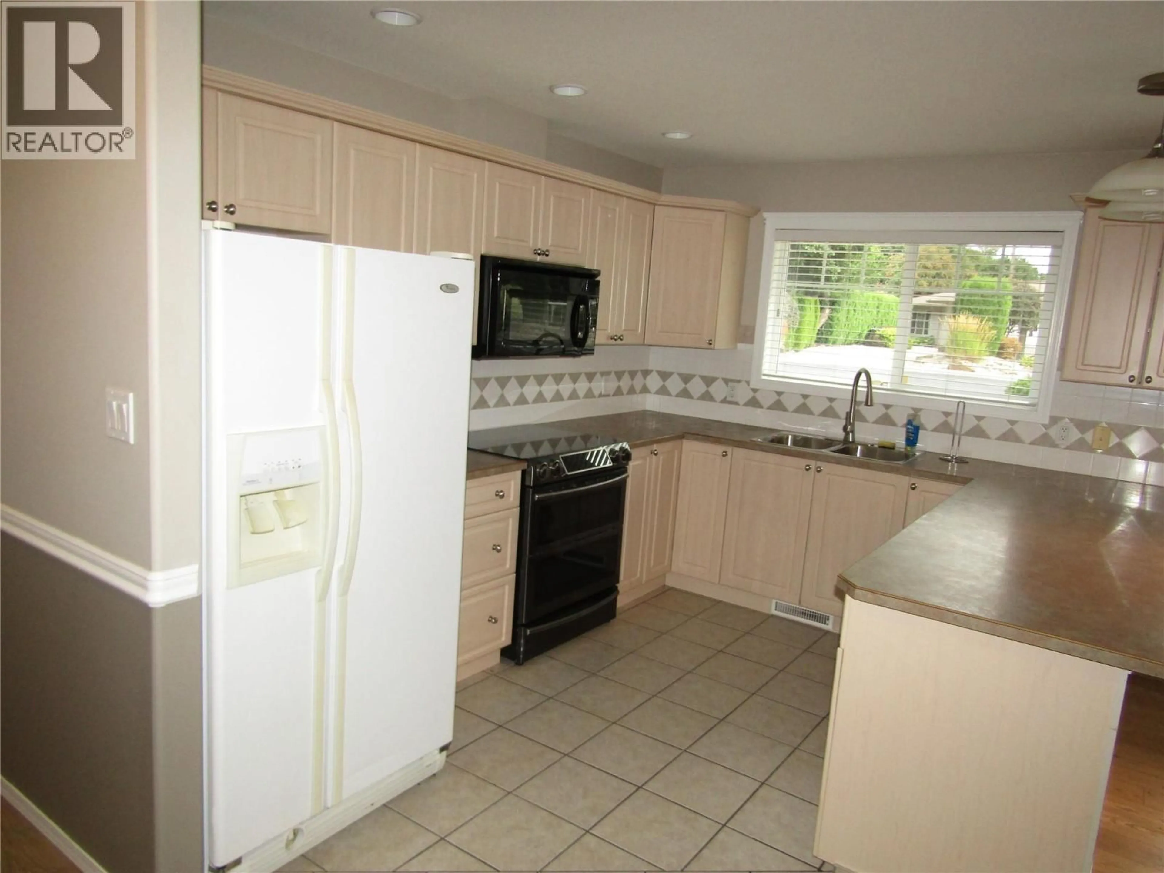 Standard kitchen, ceramic/tile floor for #5 - 707 76TH AVENUE, Grand Forks British Columbia V0H1H0