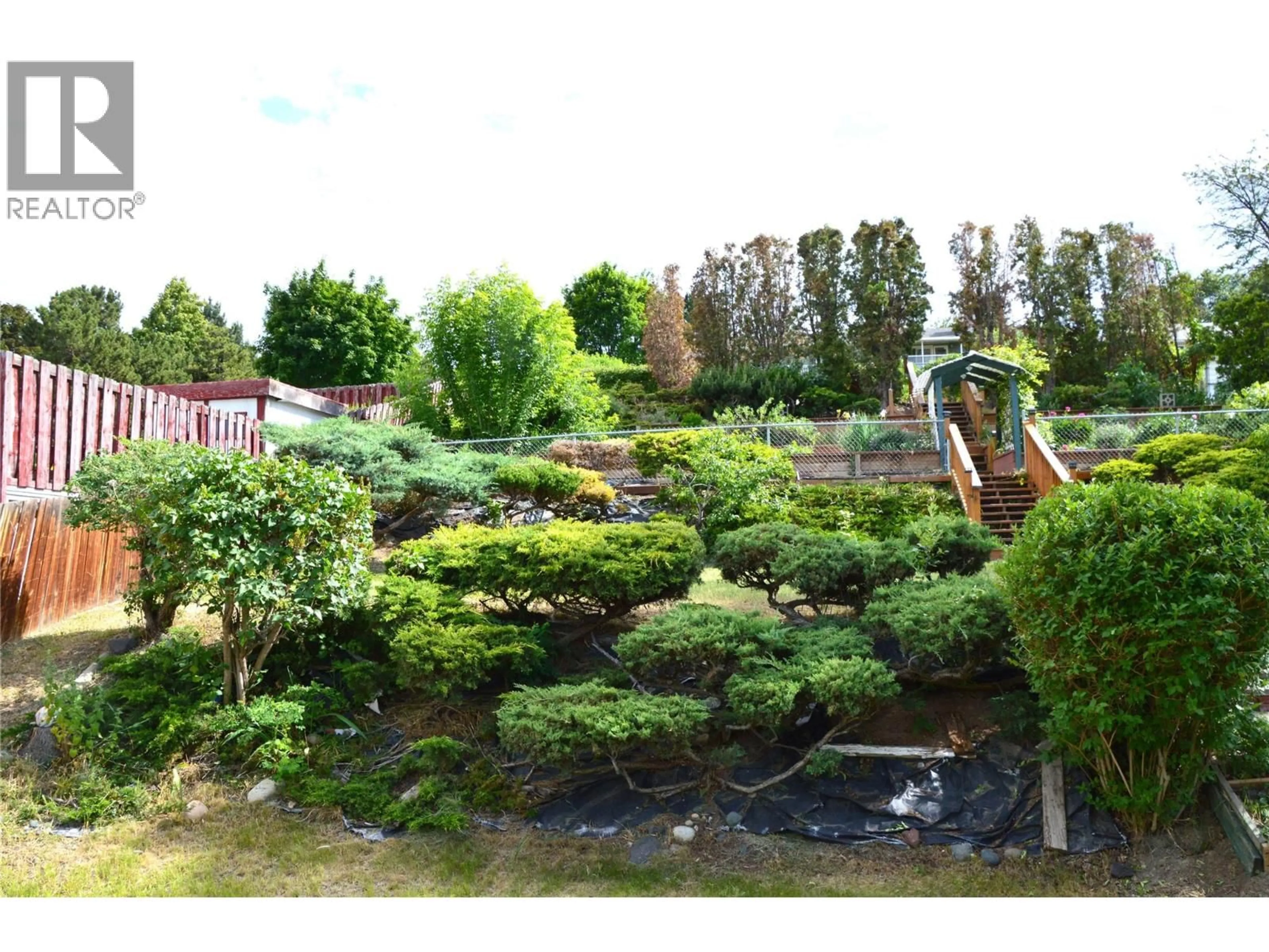 A pic from outside/outdoor area/front of a property/back of a property/a pic from drone, forest/trees view for 507 STRATHCONA TERRACE, Kamloops British Columbia V2C1C2