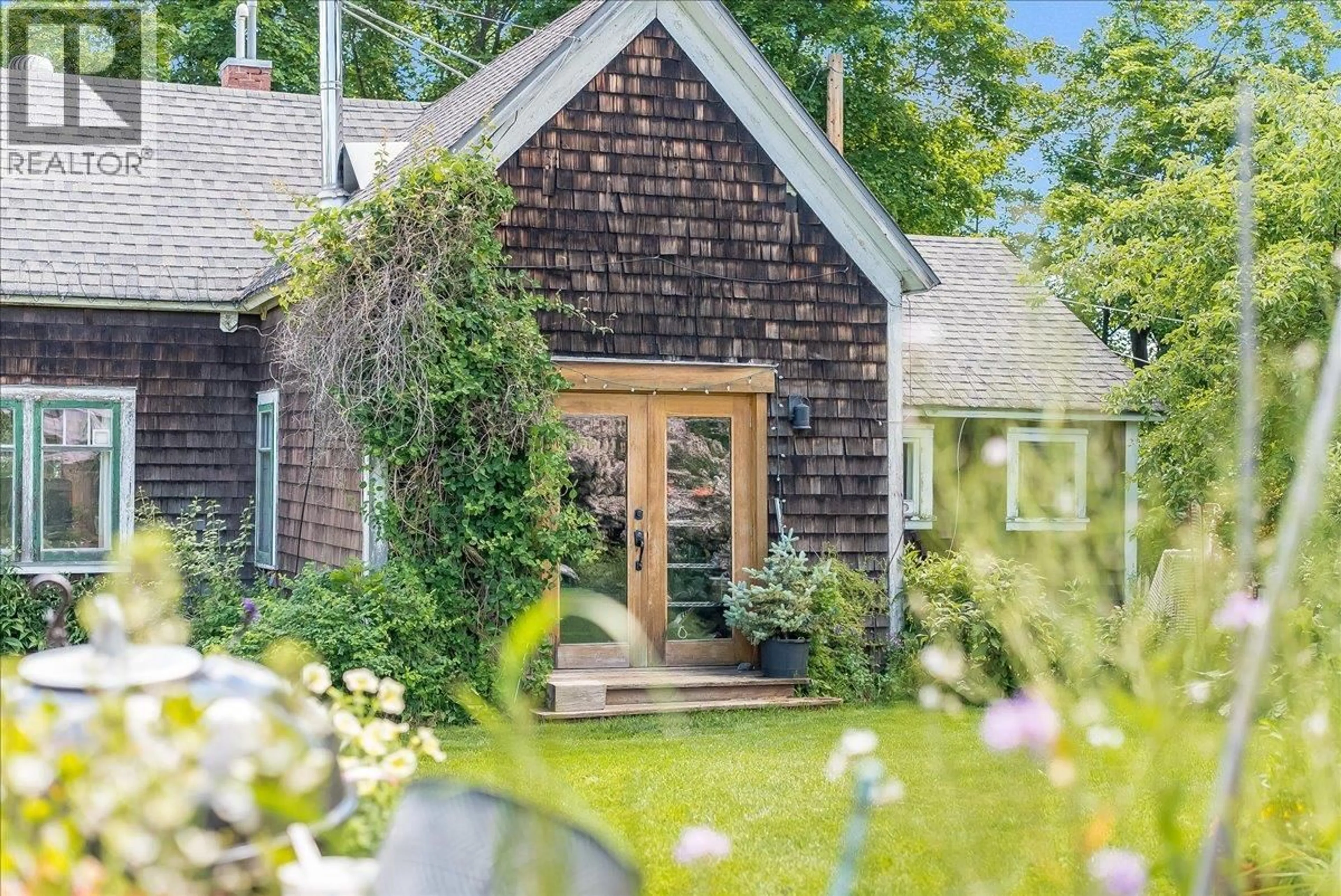 Home with brick exterior material, street for 2433 FIRST AVENUE, Rossland British Columbia V0G1Y0