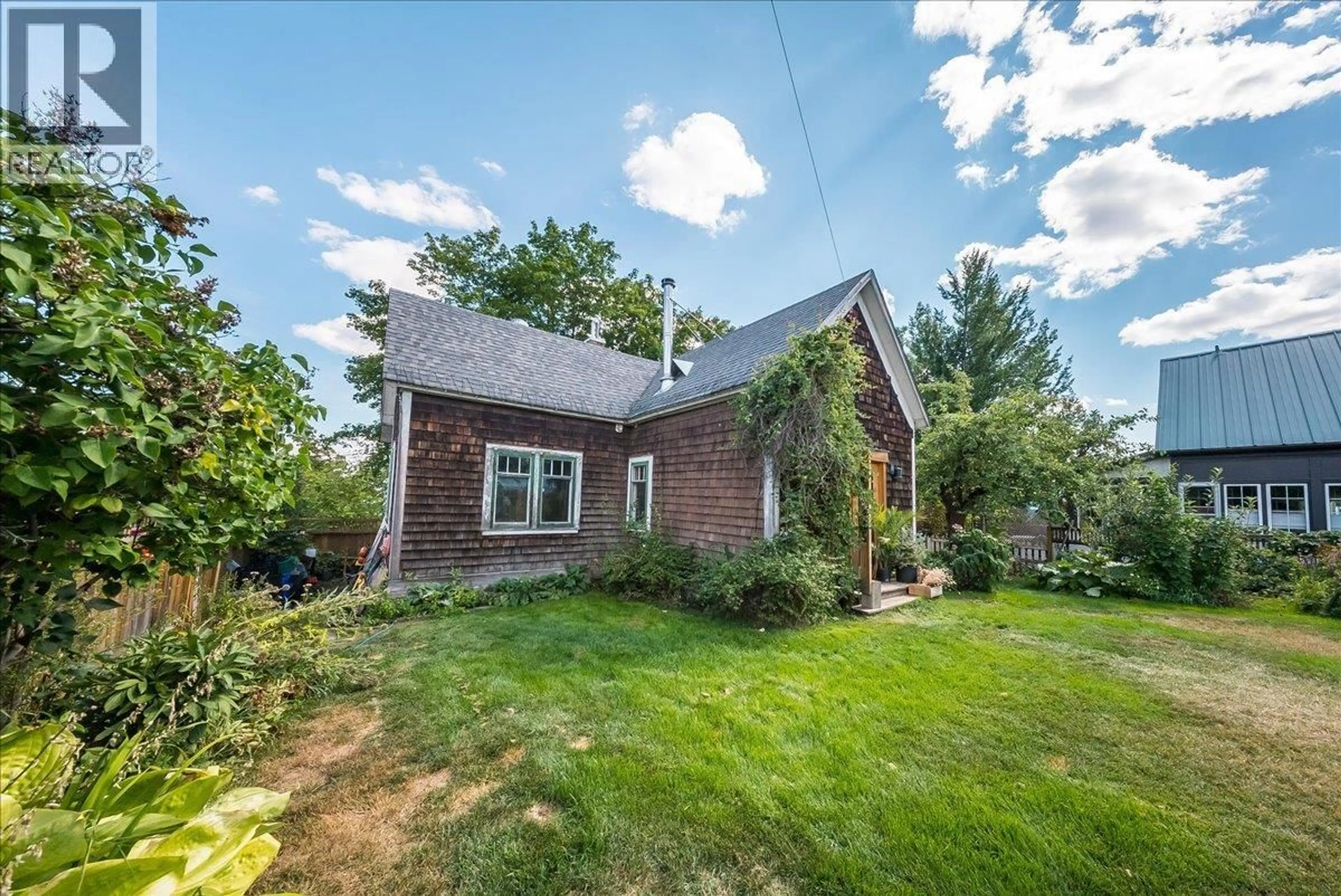 A pic from outside/outdoor area/front of a property/back of a property/a pic from drone, street for 2433 FIRST AVENUE, Rossland British Columbia V0G1Y0