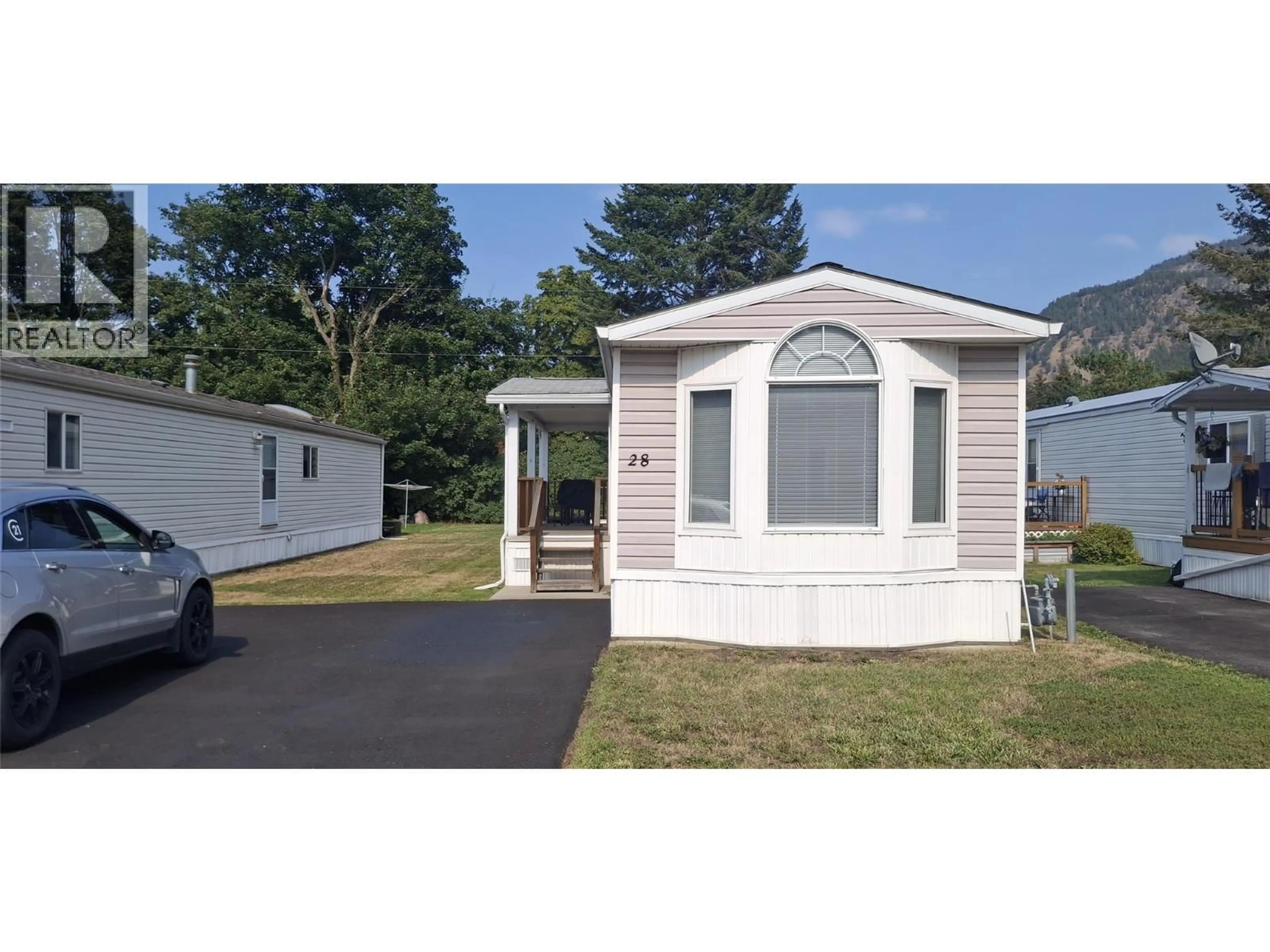 Home with vinyl exterior material, water/lake/river/ocean view for 28 - 161 SHUSWAP AVENUE, Chase British Columbia V0E1M0