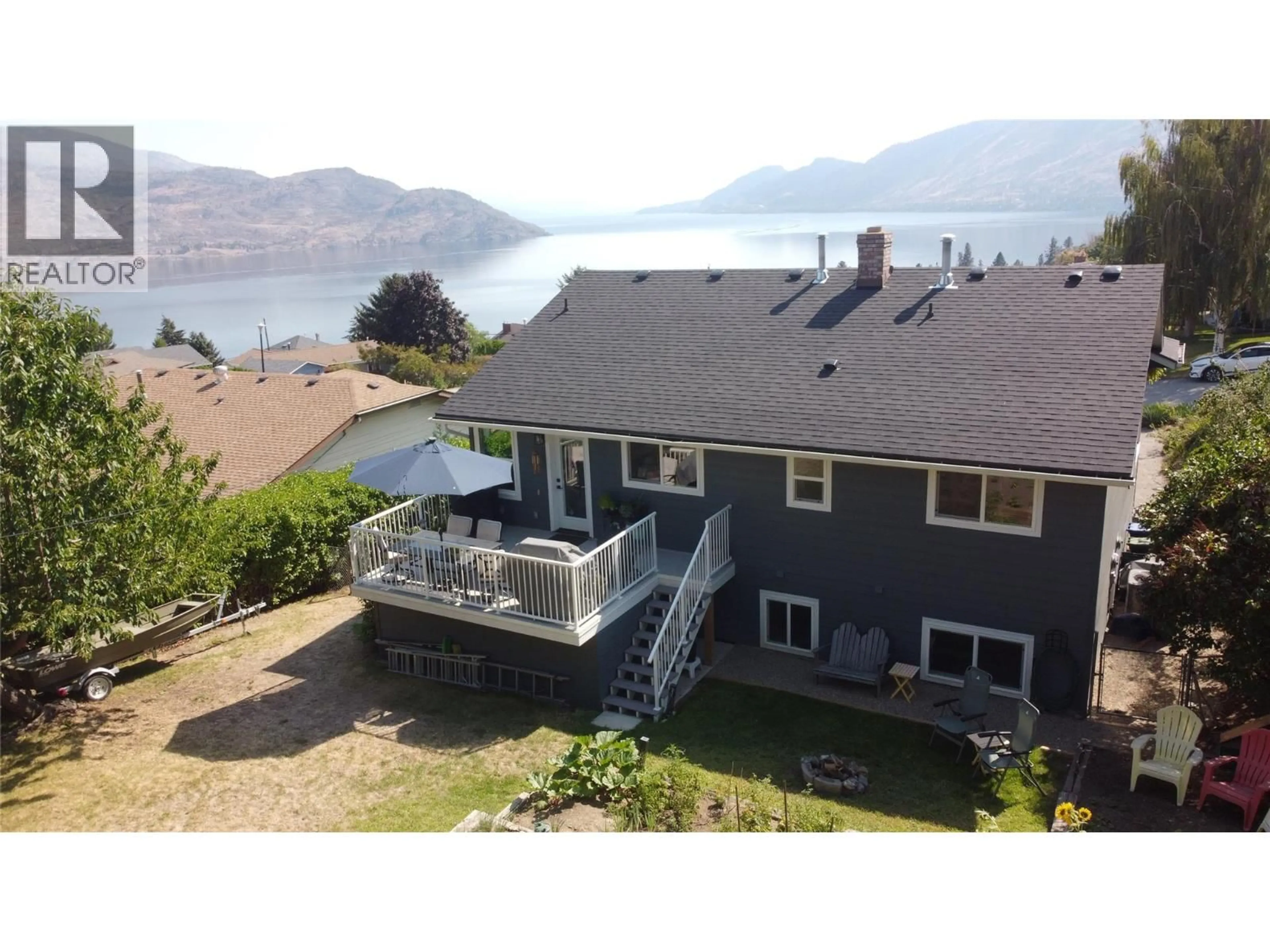 A pic from outside/outdoor area/front of a property/back of a property/a pic from drone, water/lake/river/ocean view for 6160 DAVIES CRESCENT, Peachland British Columbia V0H1X7