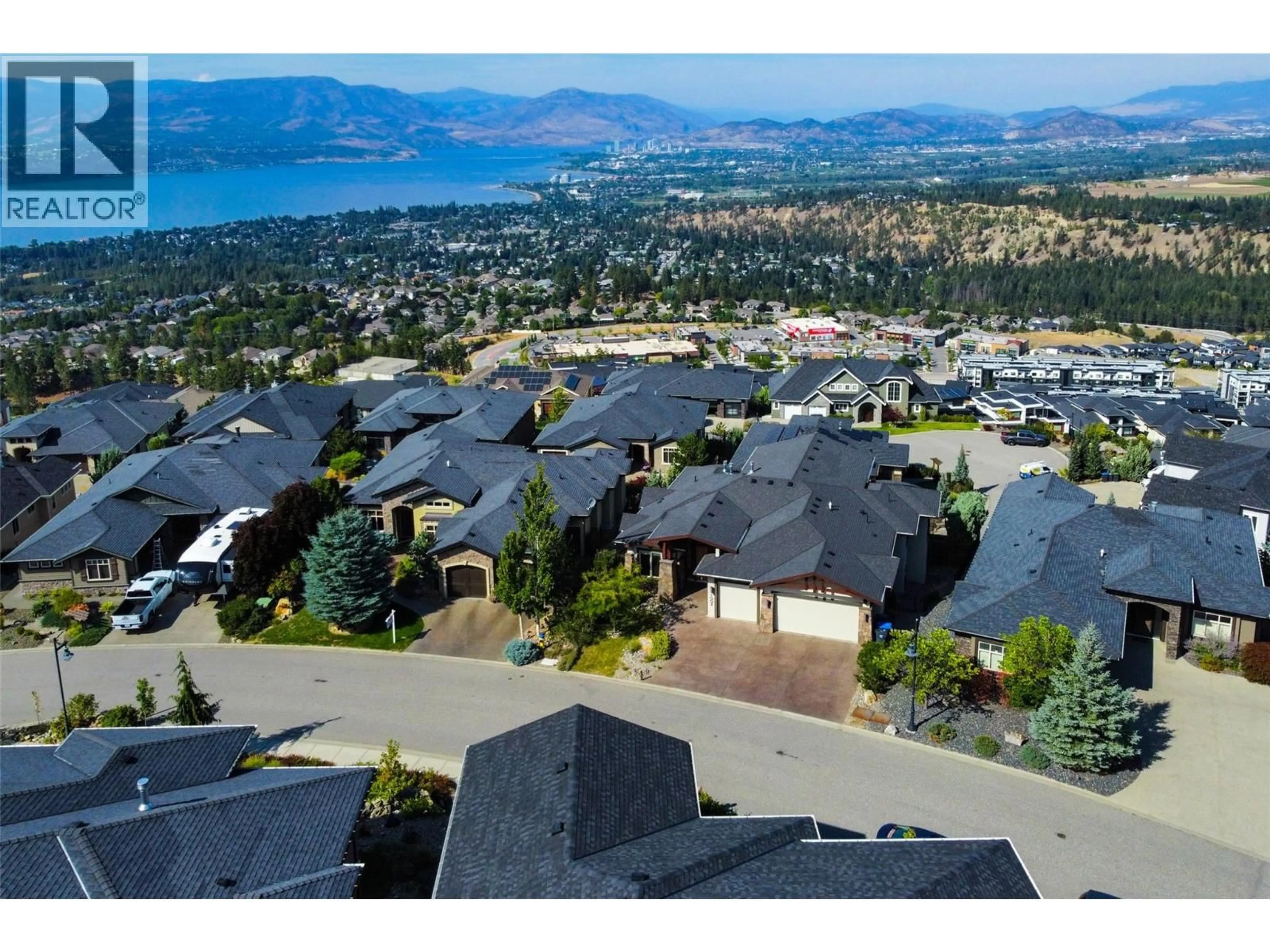 A pic from outside/outdoor area/front of a property/back of a property/a pic from drone, mountain view for 1002 HEWETSON AVENUE, Kelowna British Columbia V1W5H8