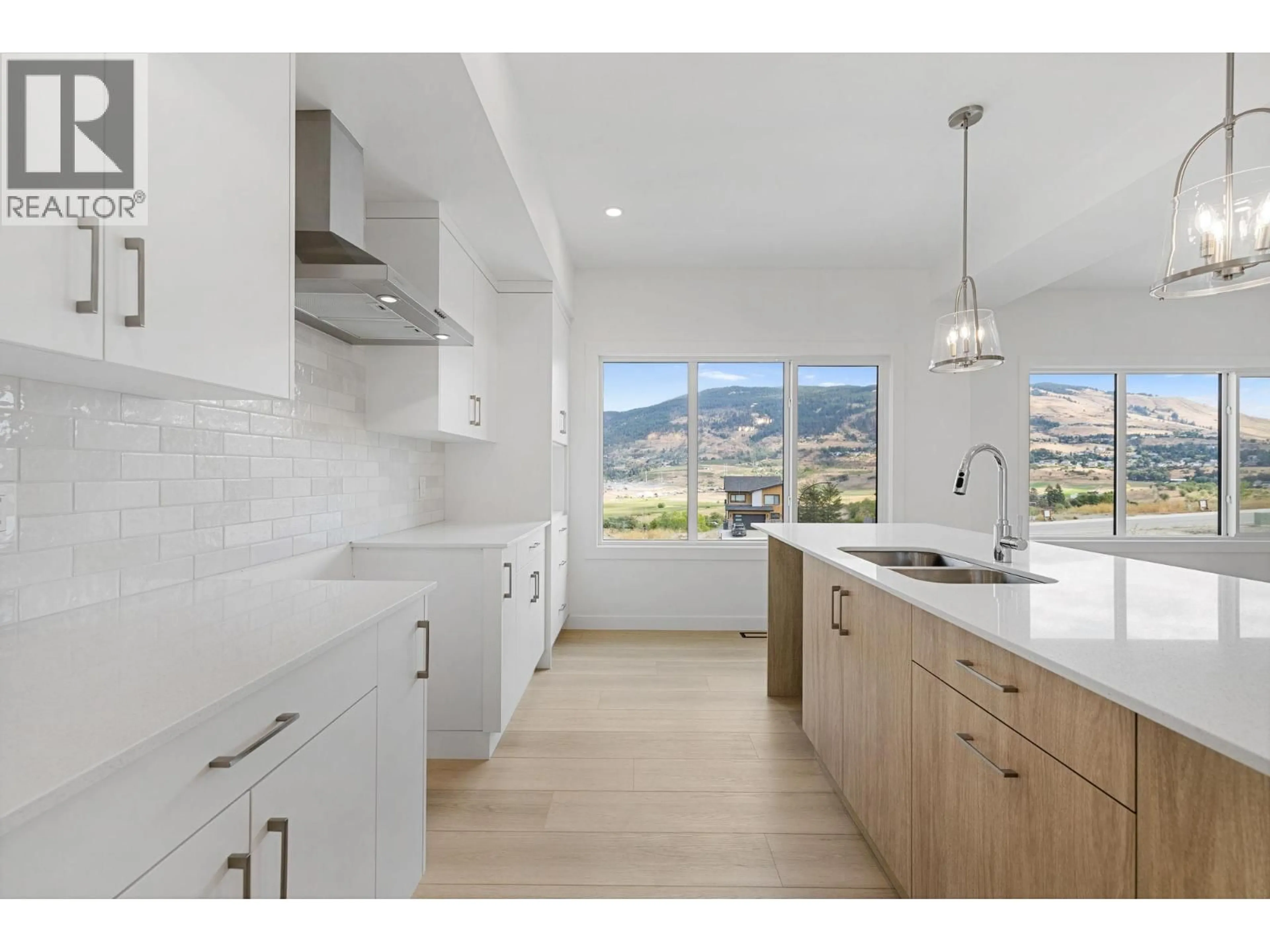 Open concept kitchen, ceramic/tile floor for 434 ARROWLEAF RISE, Coldstream British Columbia V1B2M4