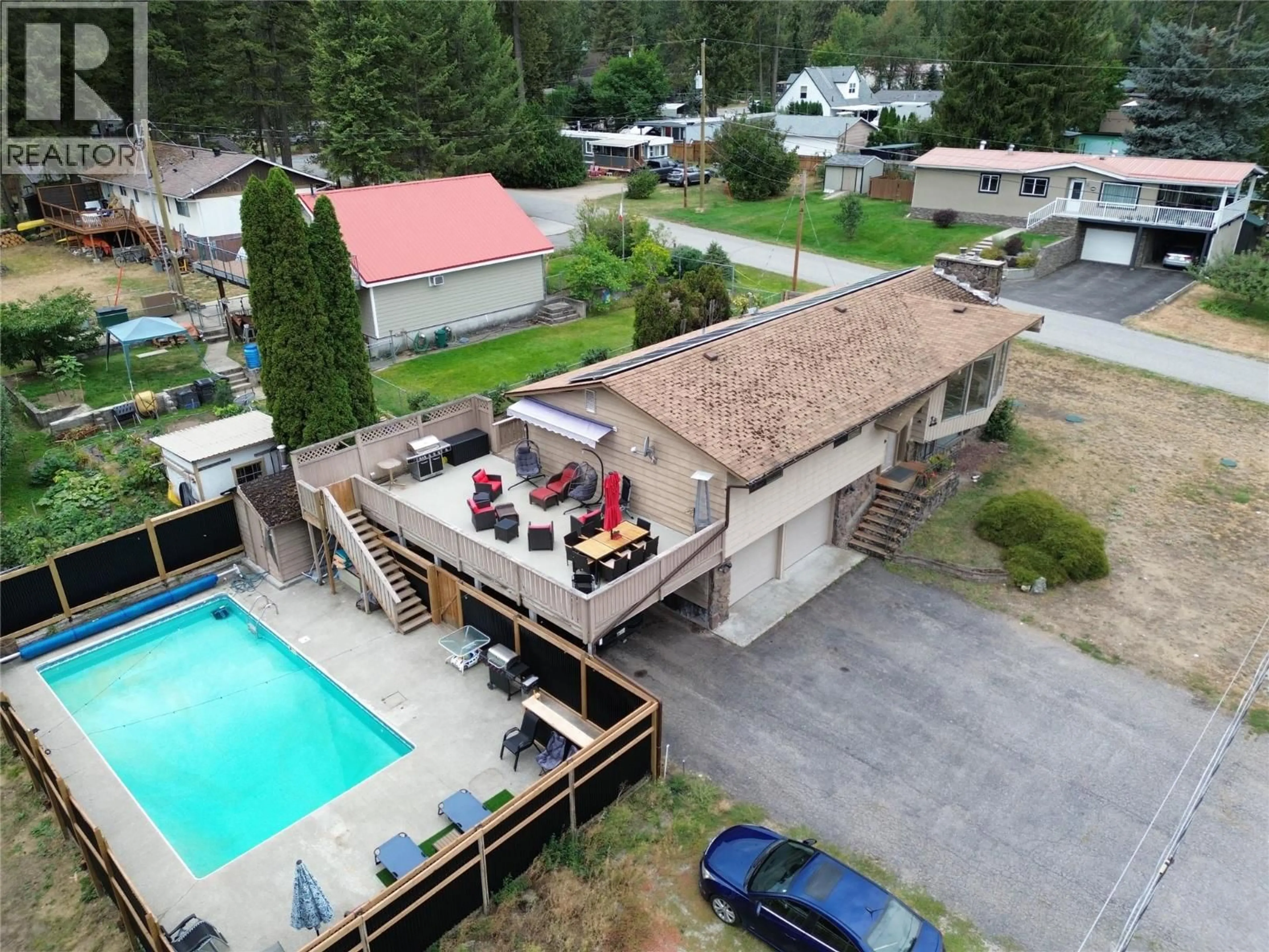 A pic from outside/outdoor area/front of a property/back of a property/a pic from drone, mountain view for 93 HOLMES ROAD, Christina Lake British Columbia V0H1E0