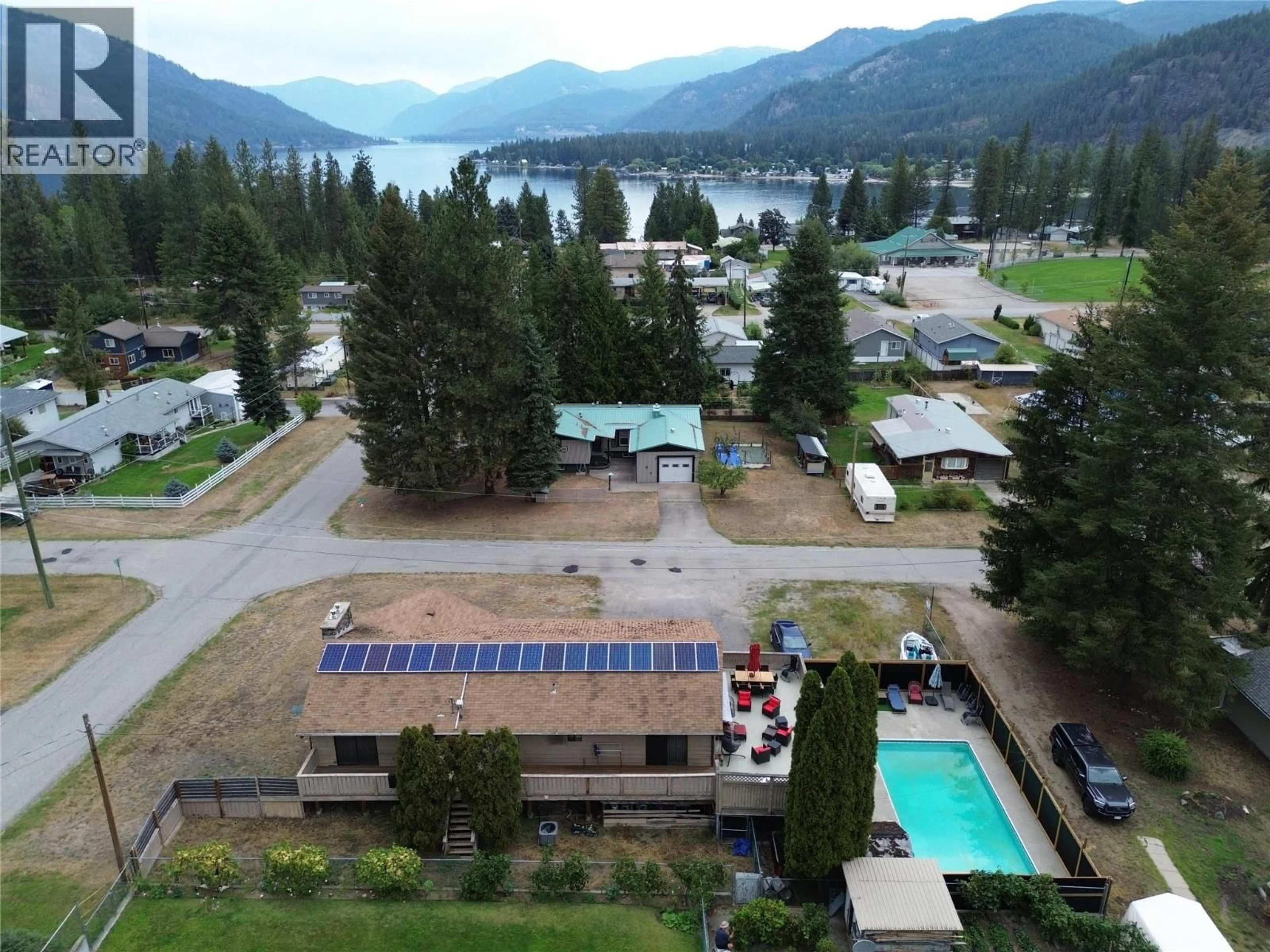 A pic from outside/outdoor area/front of a property/back of a property/a pic from drone, mountain view for 93 HOLMES ROAD, Christina Lake British Columbia V0H1E0