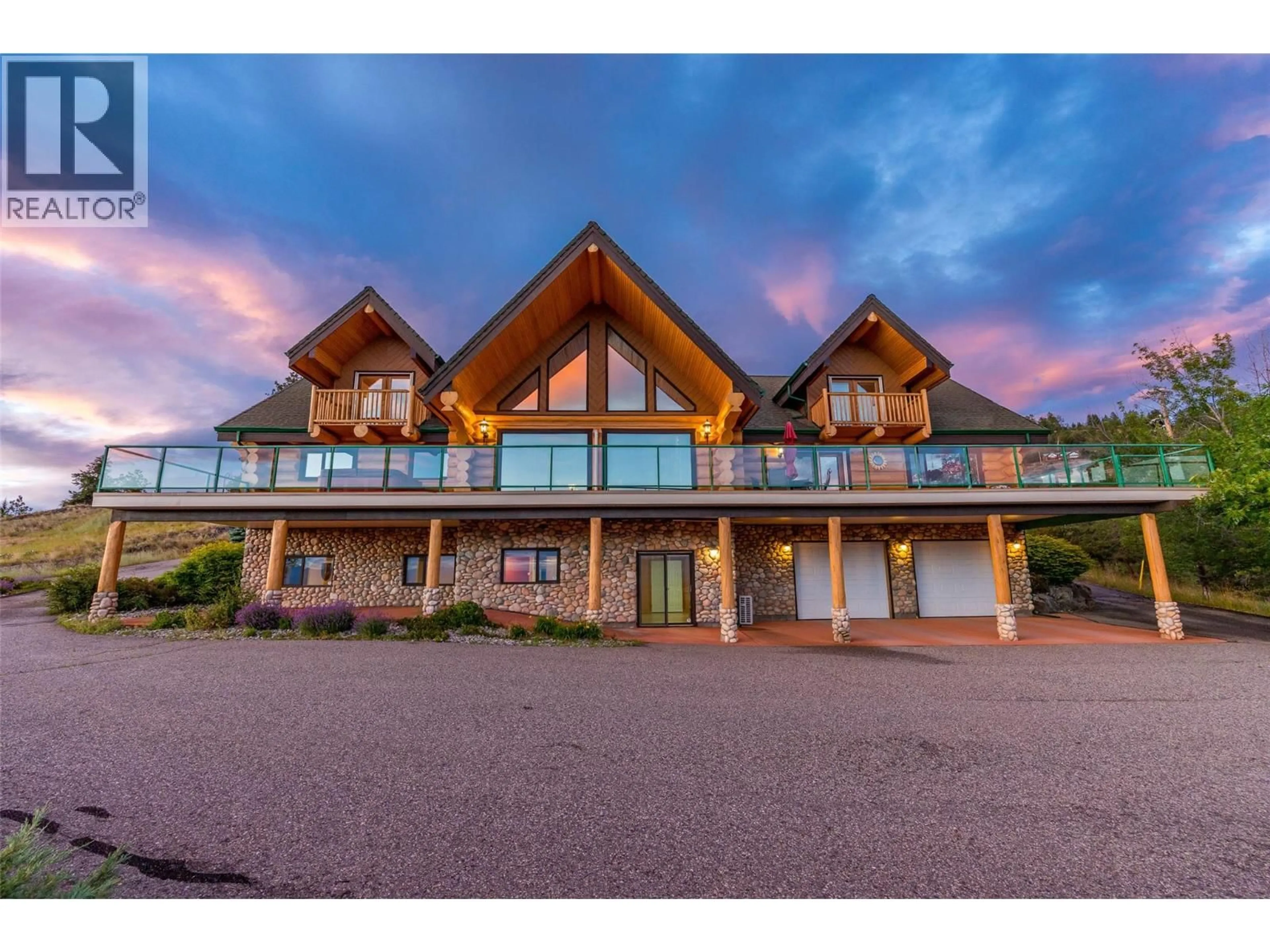 A pic from outside/outdoor area/front of a property/back of a property/a pic from drone, mountain view for 4520 FARMERS DRIVE, Kelowna British Columbia V1P1A3