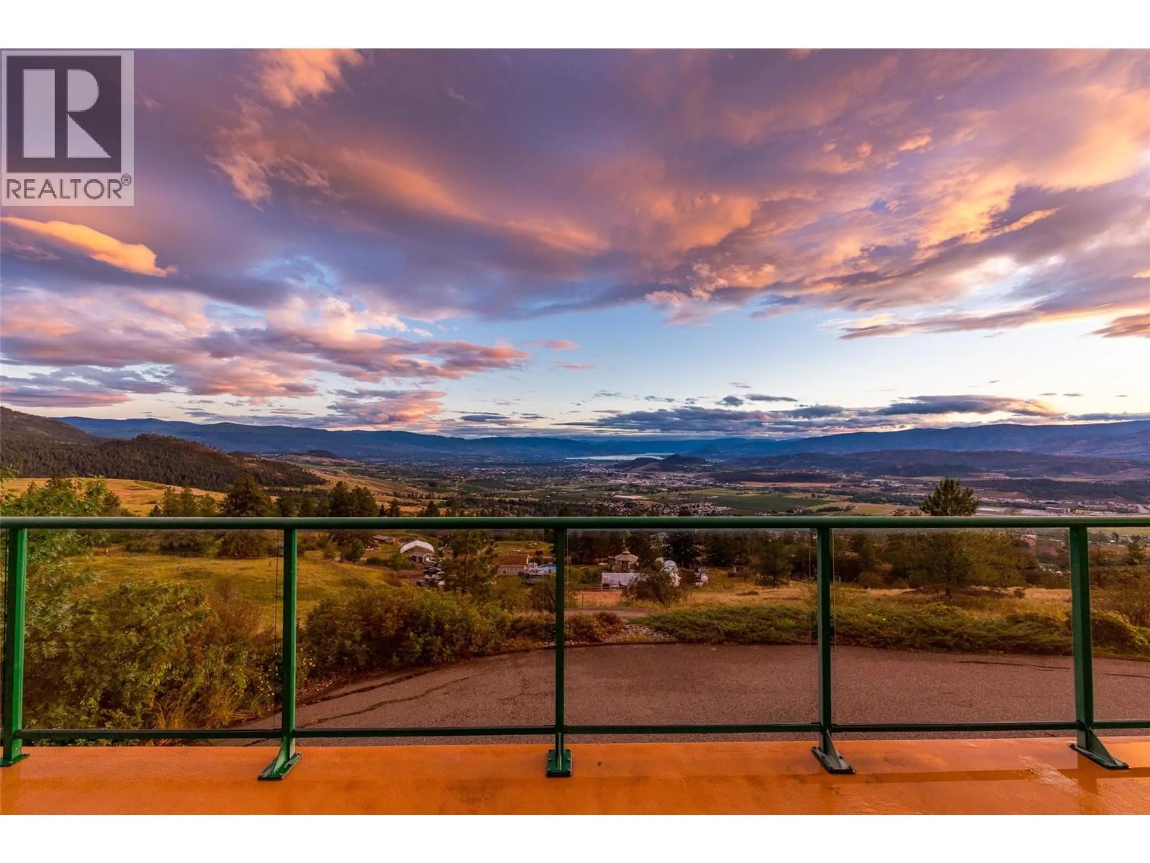 A pic from outside/outdoor area/front of a property/back of a property/a pic from drone, mountain view for 4520 FARMERS DRIVE, Kelowna British Columbia V1P1A3