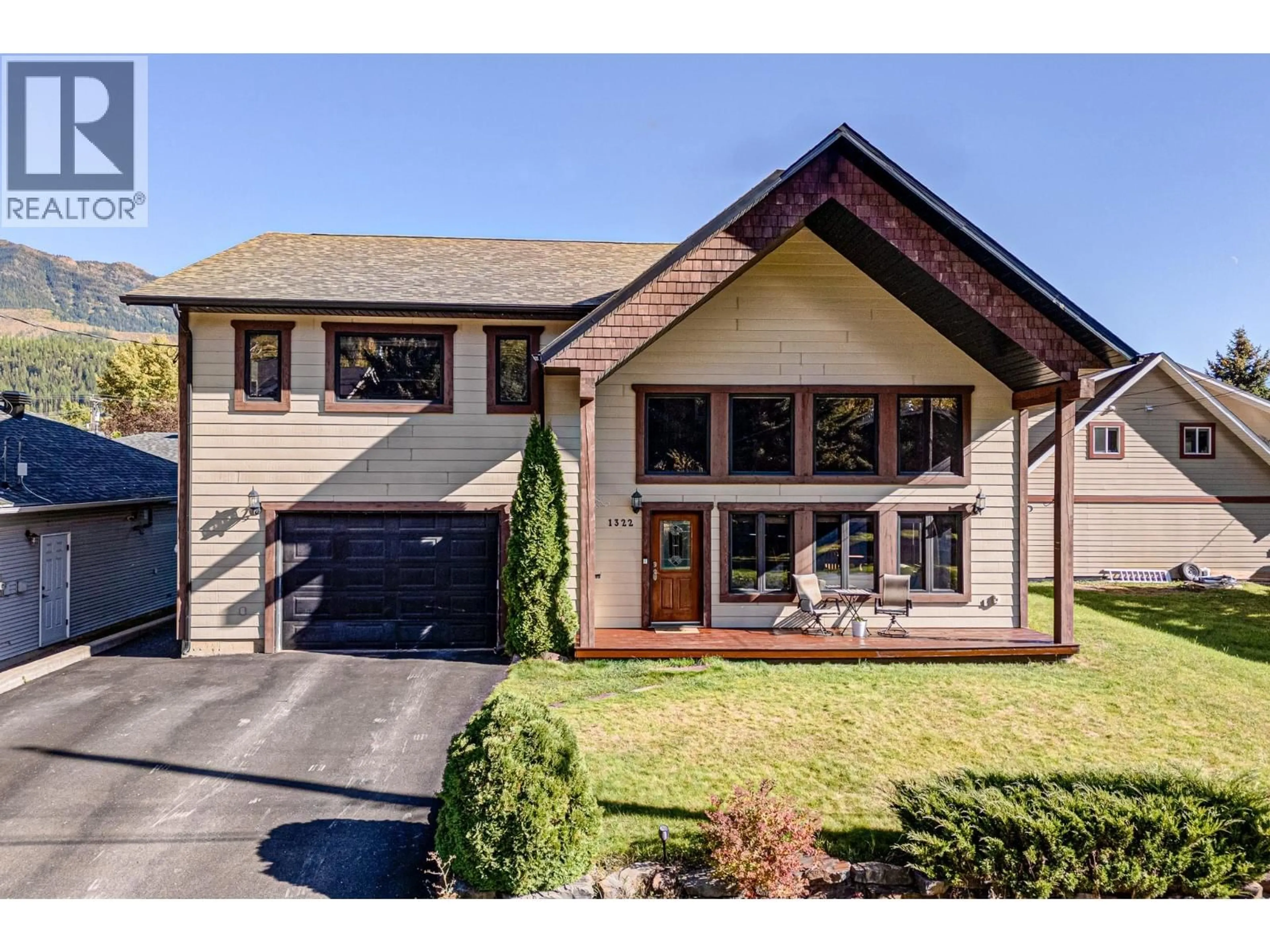 Home with brick exterior material, street for 1322 11TH AVENUE, Fernie British Columbia V0B1M0