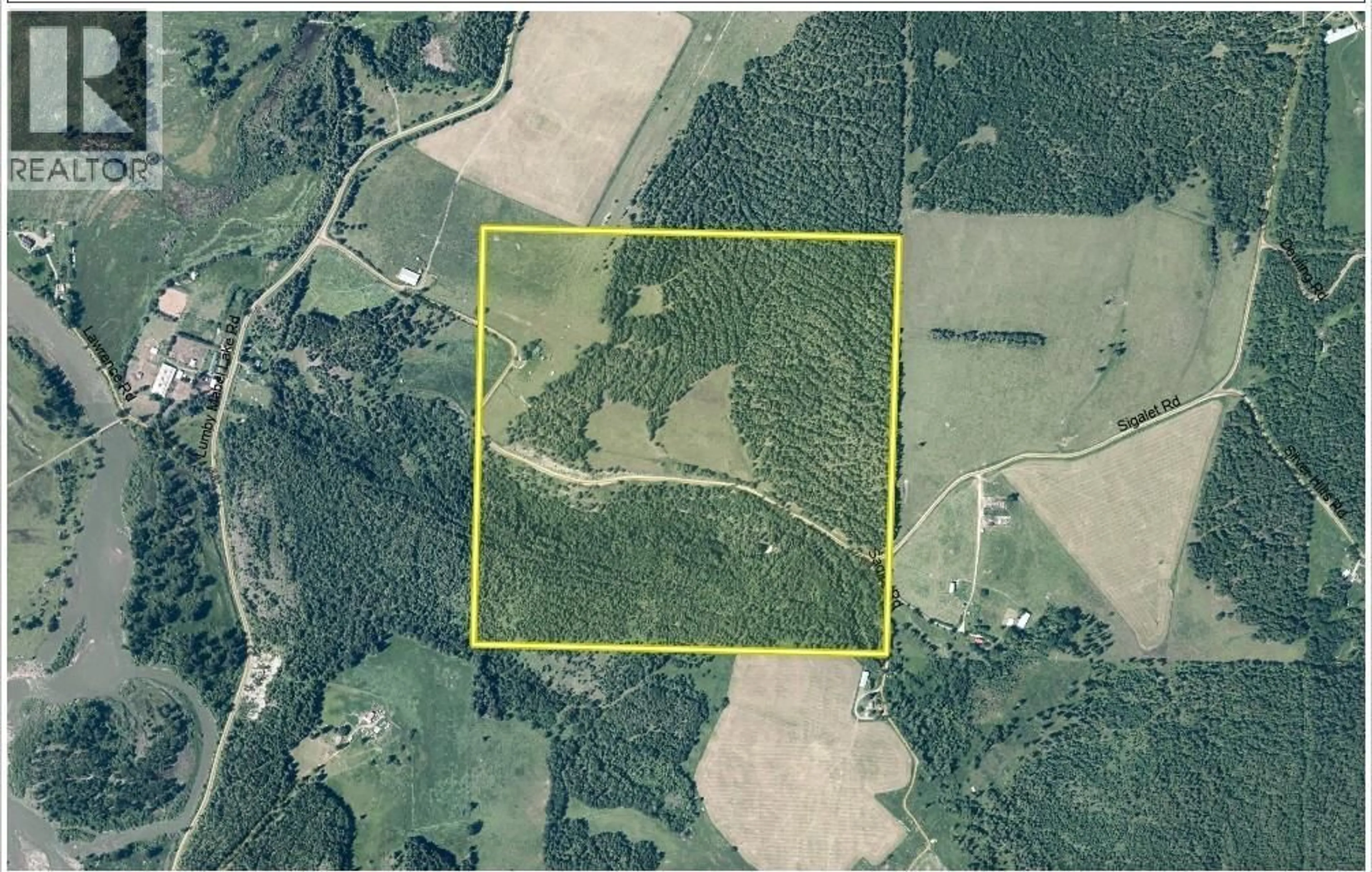 A pic from outside/outdoor area/front of a property/back of a property/a pic from drone, forest/trees view for 43 SIGALET ROAD, Lumby British Columbia V0E2G6